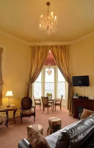 Bedroom, Seating Area in Geiser Grand Hotel