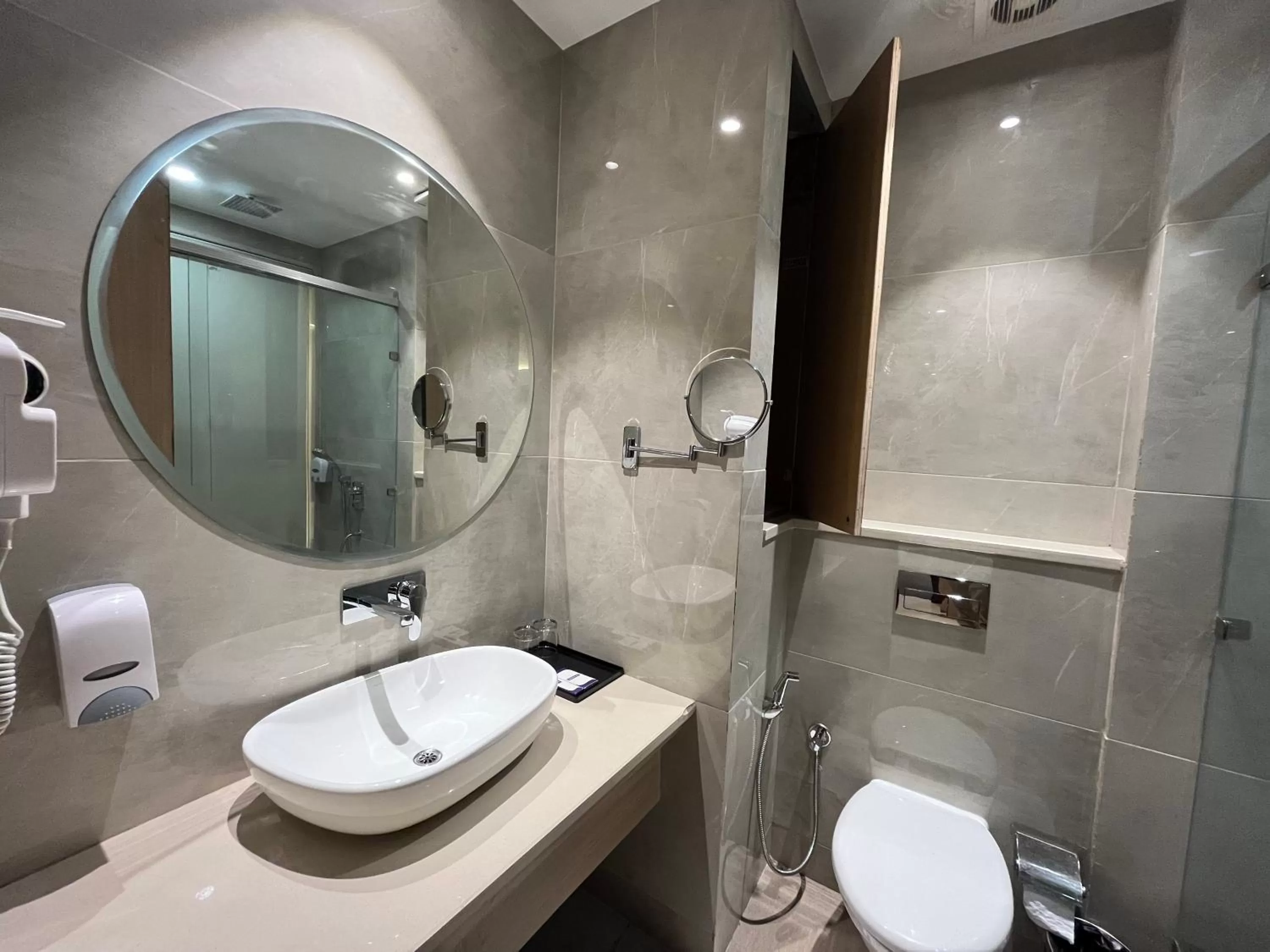 Bathroom in RRV Hotel
