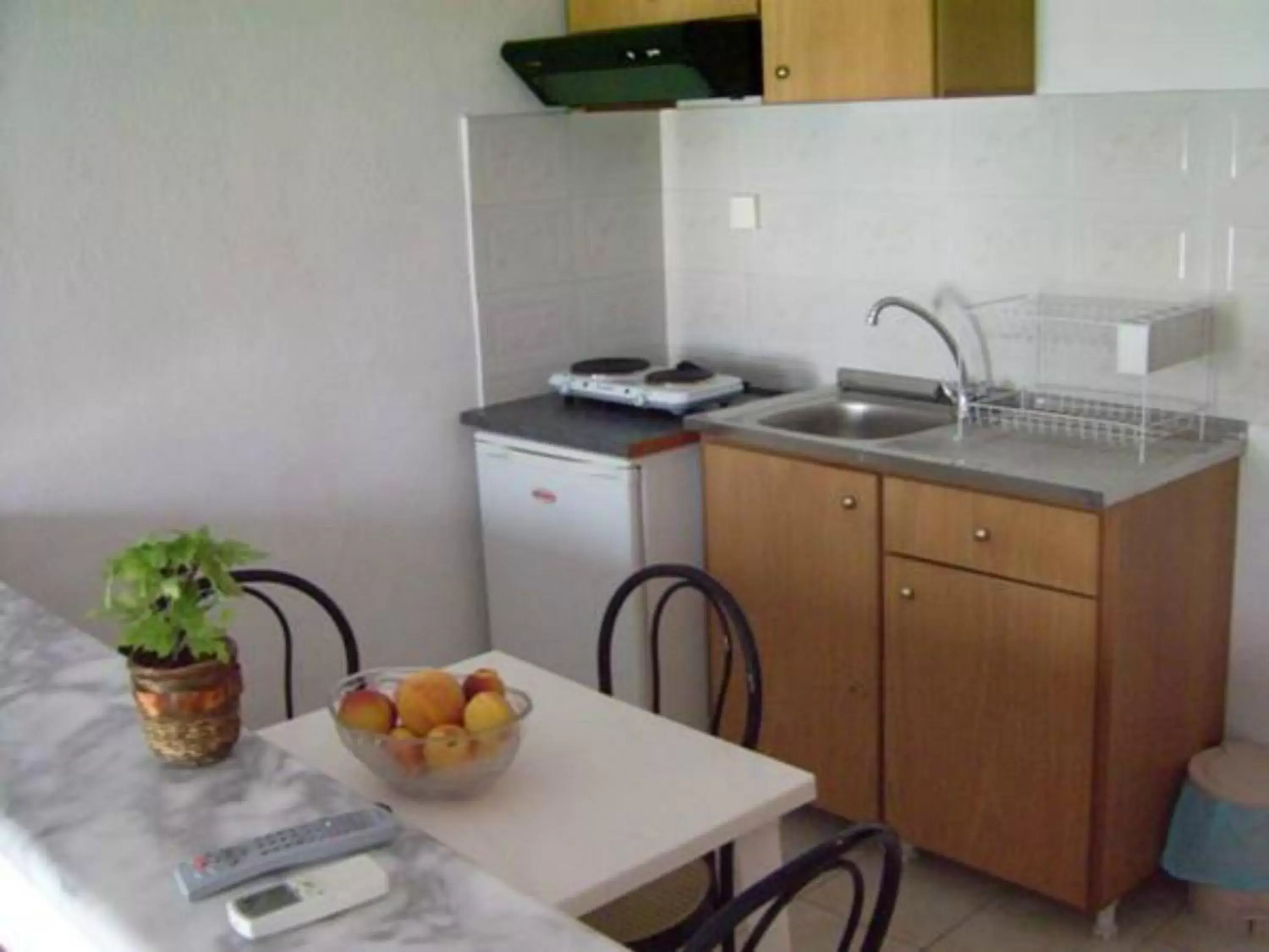 Kitchen or kitchenette, Kitchen/Kitchenette in Alexandros Hotel