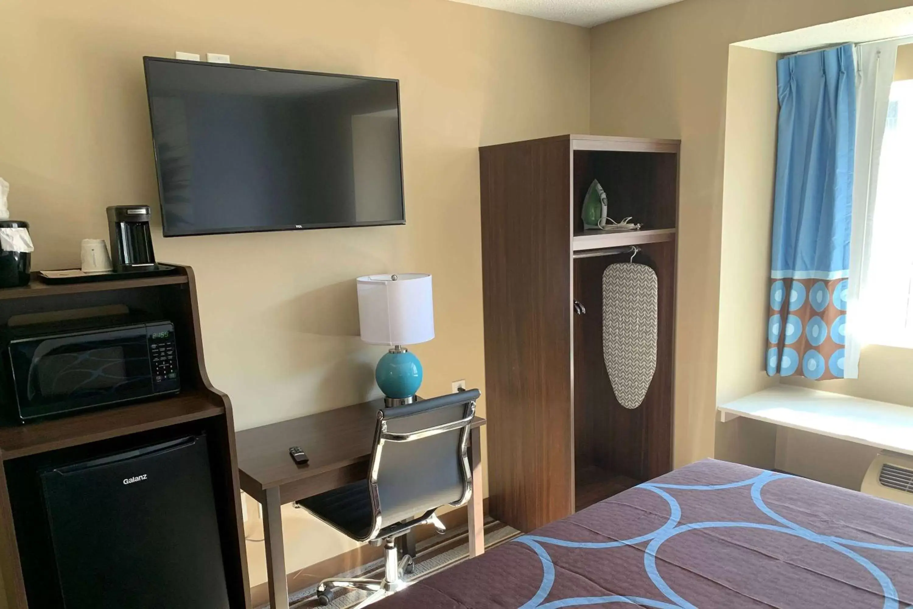 Photo of the whole room, TV/Entertainment Center in Super 8 by Wyndham Joliet