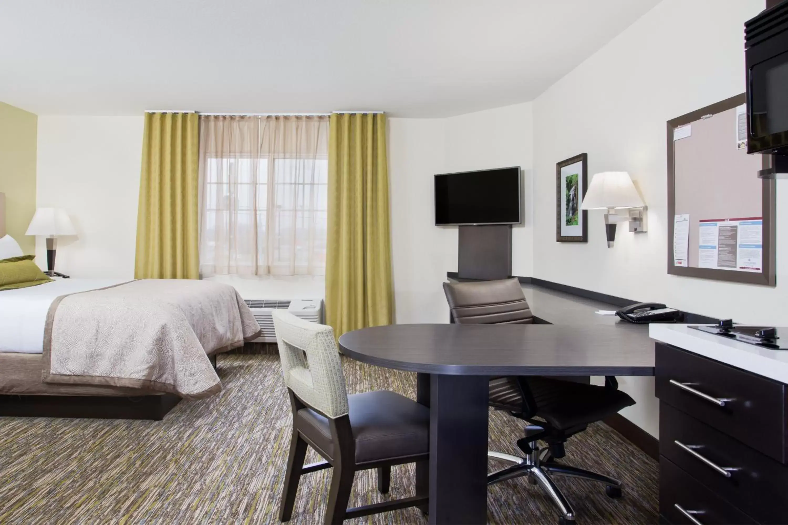 Photo of the whole room, Bed in Candlewood Suites Fort Campbell - Oak Grove by IHG Photo of the whole room, Bed in Candlewood Suites Fort Campbell - Oak Grove by IHG