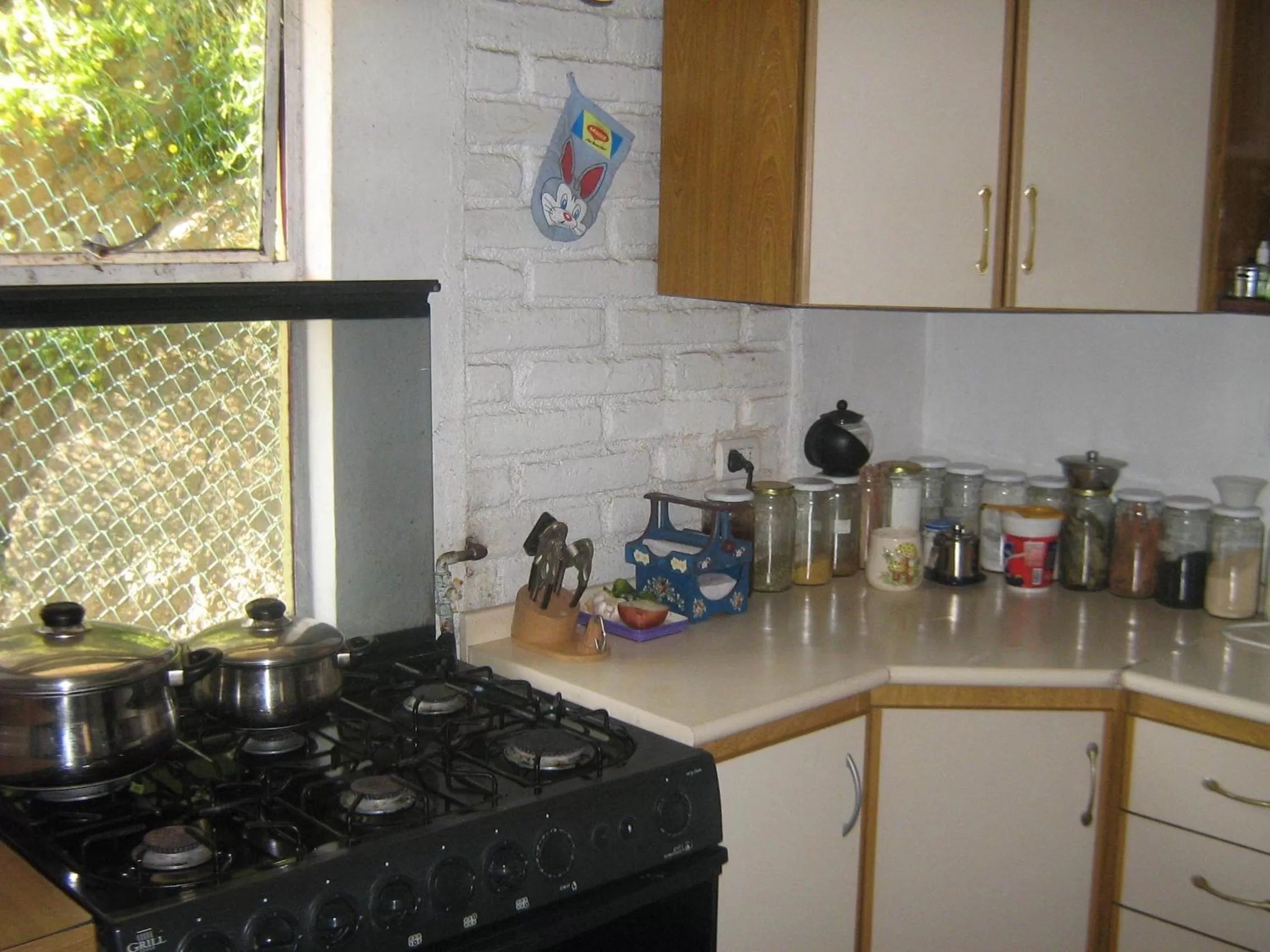 Kitchen or kitchenette in Hostal Recuerdos de Familia