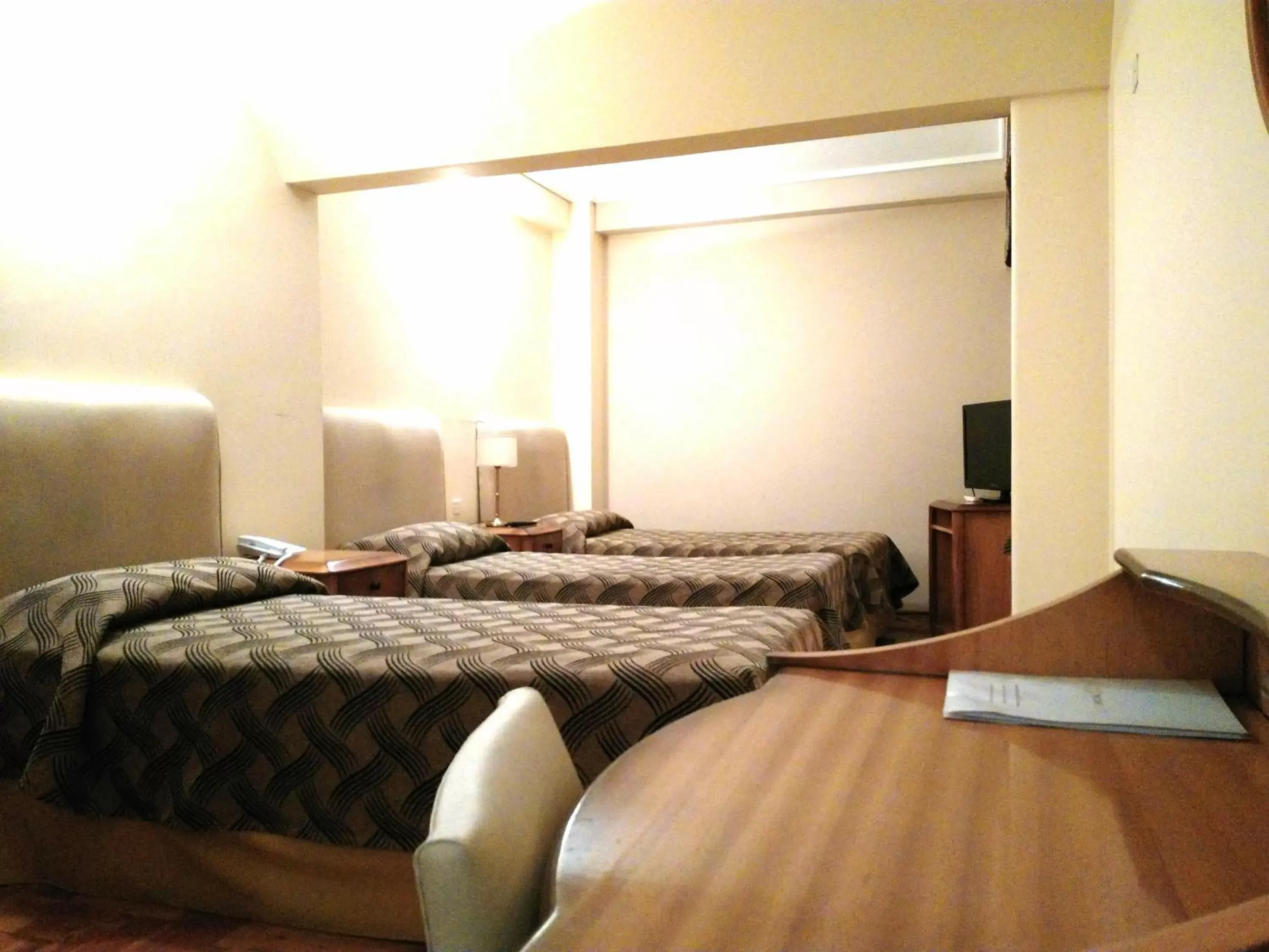 Bedroom, Room Photo in Tritone Hotel