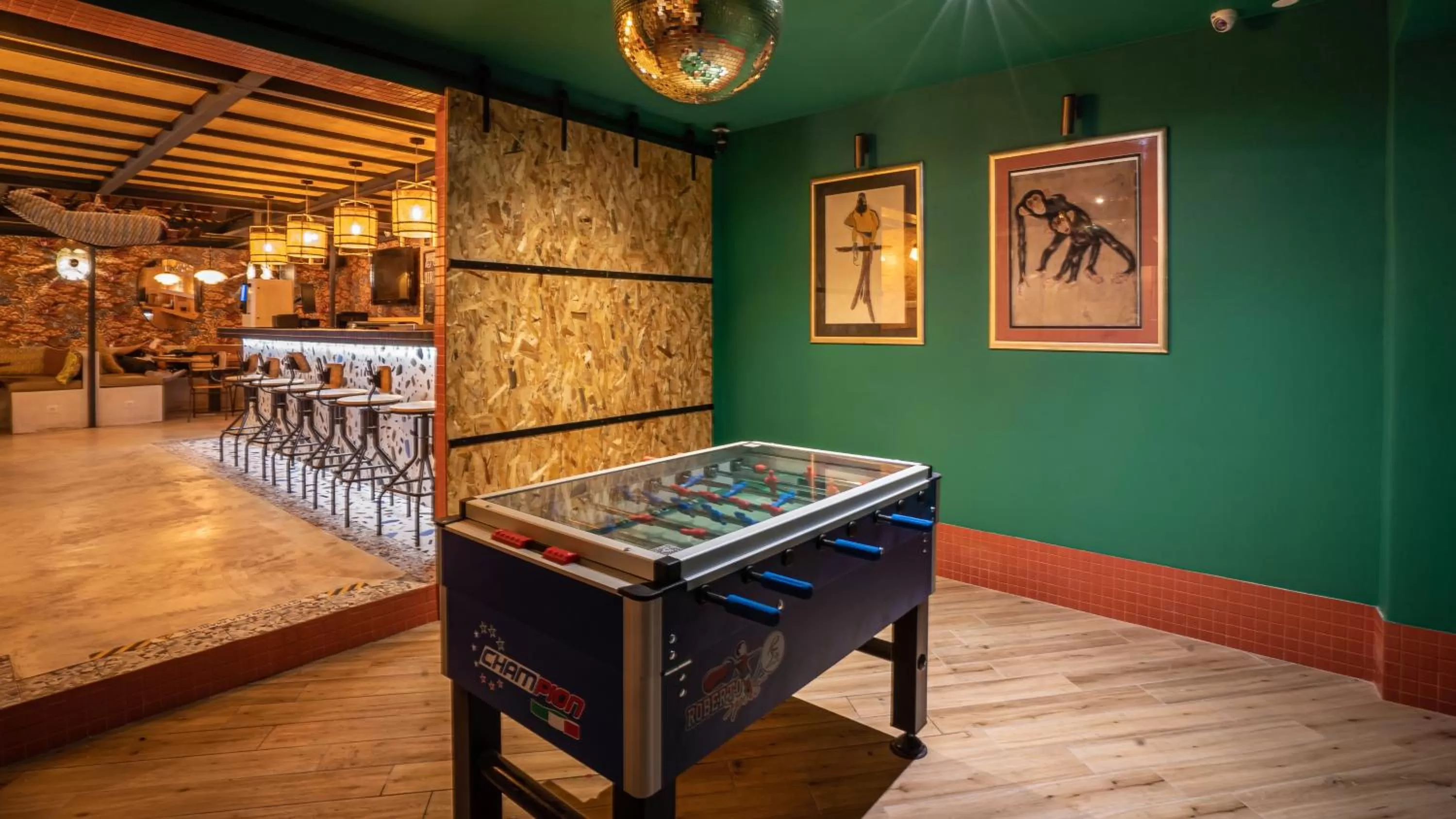 Communal lounge/ TV room in Villa Saint Exupery Beach Hostel