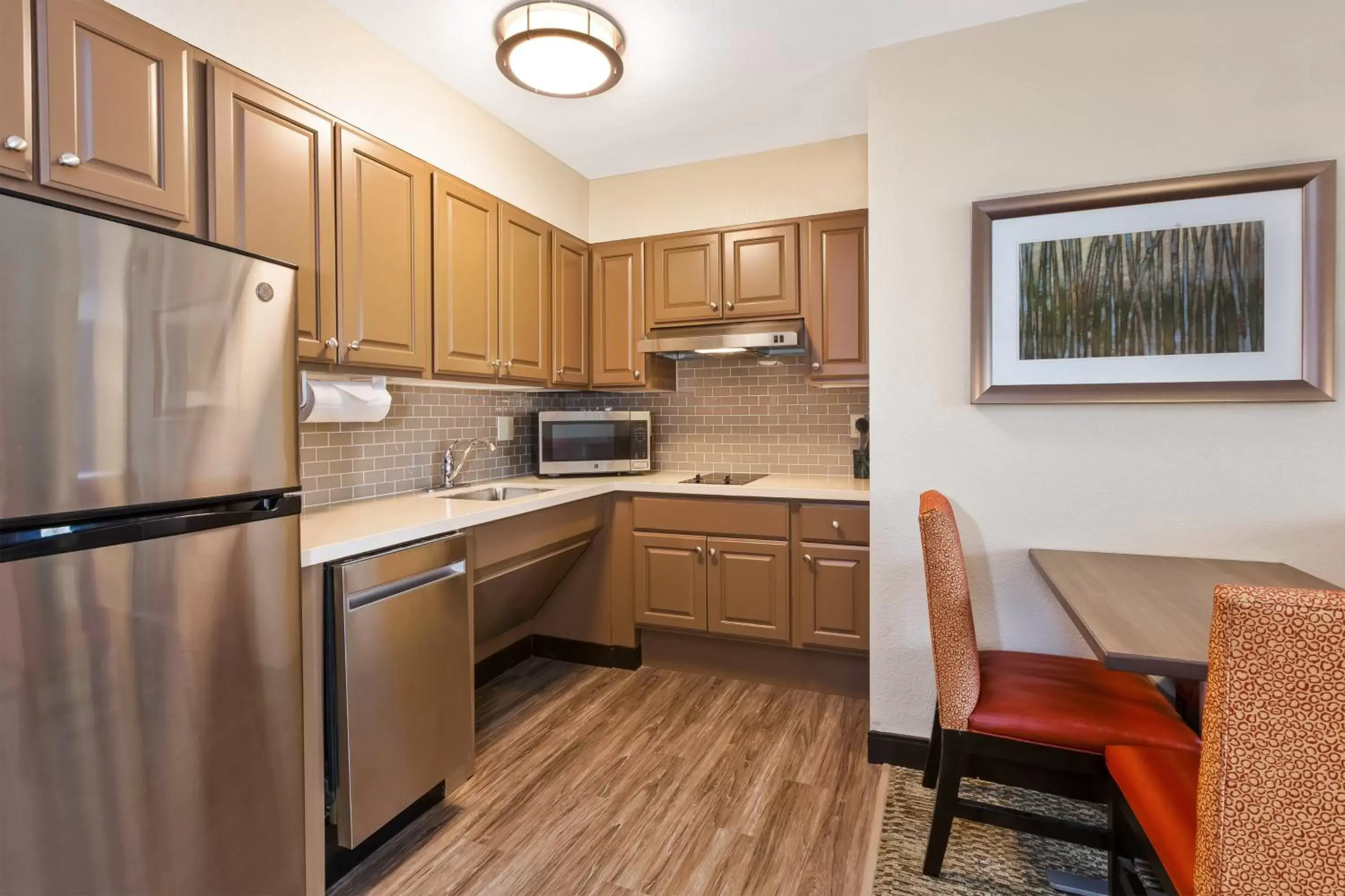 Photo of the whole room, Kitchen/Kitchenette in Staybridge Suites Kalamazoo, an IHG Hotel