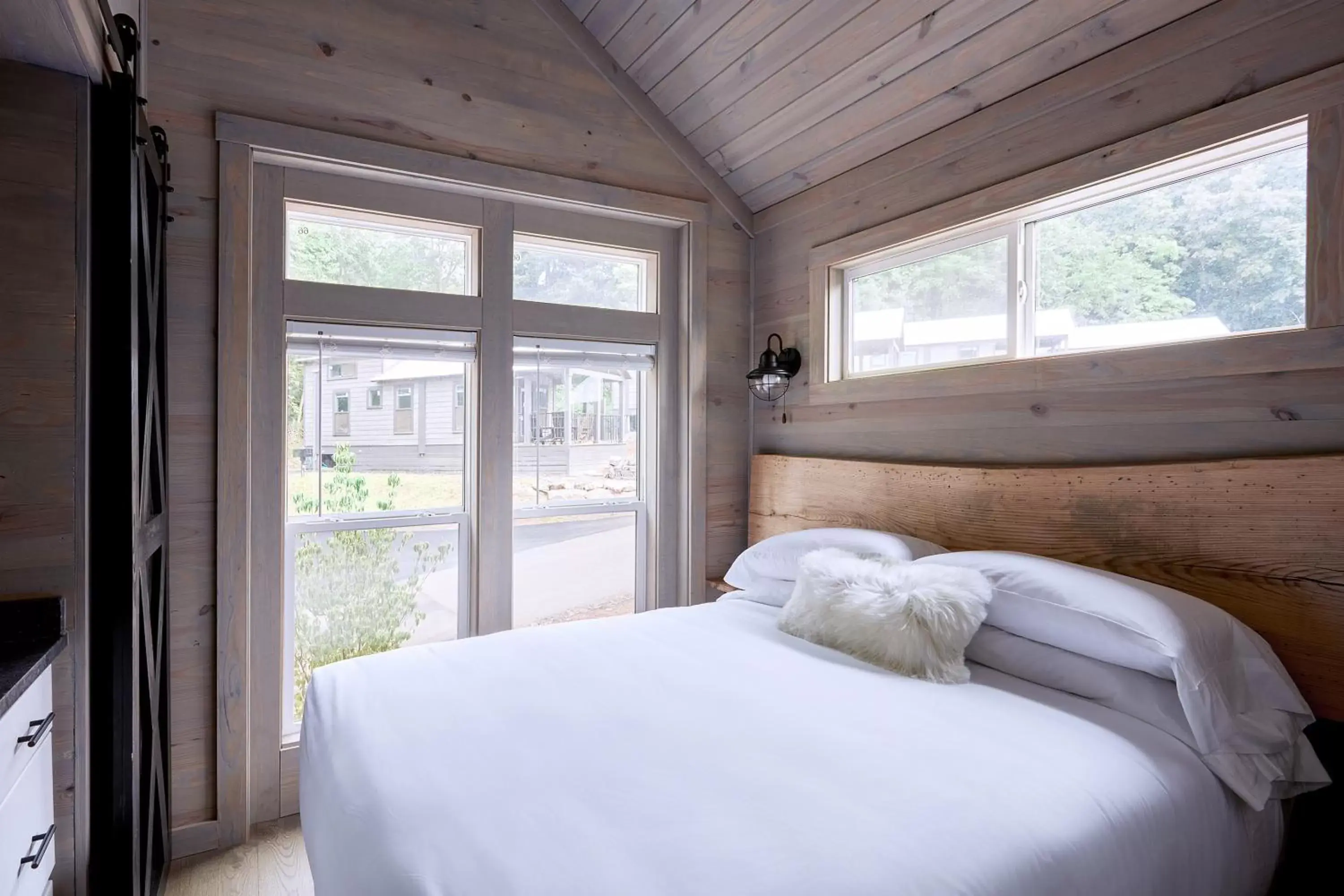 Bed in Asheville River Cabins