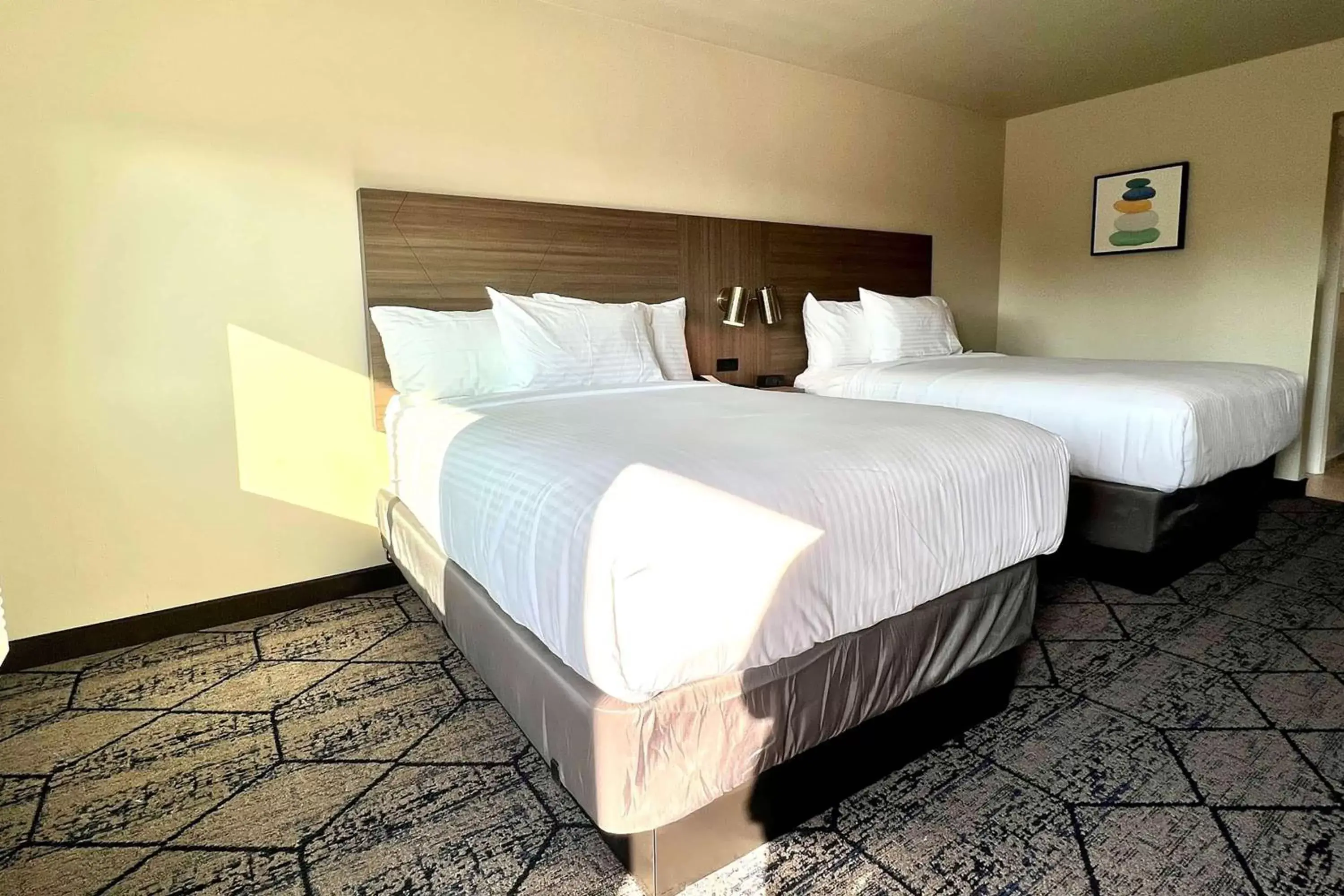 Photo of the whole room, Bed in Ramada by Wyndham Modesto Yosemite Area