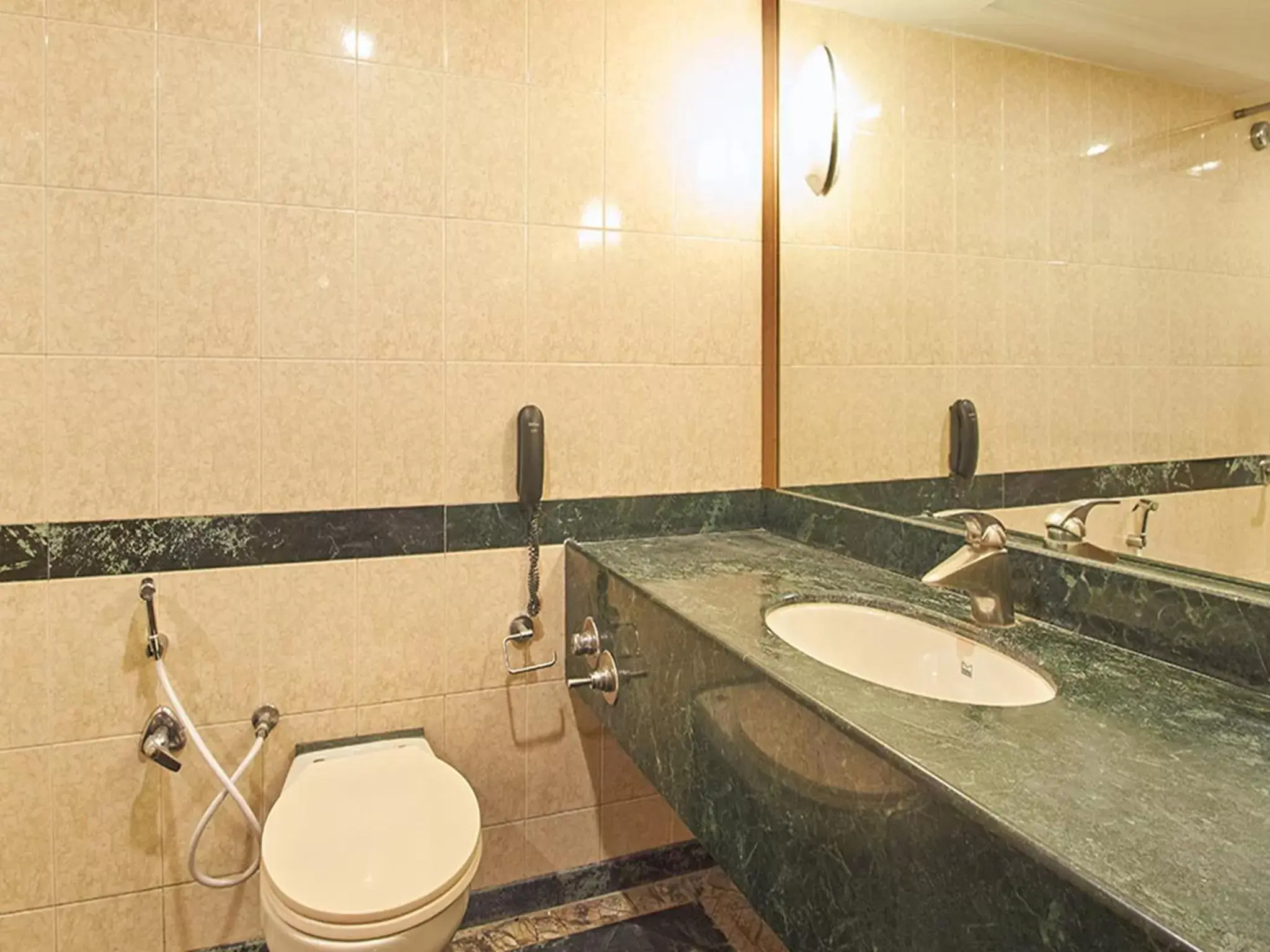 Bathroom in Sarovar Portico Rivera Ahmedabad