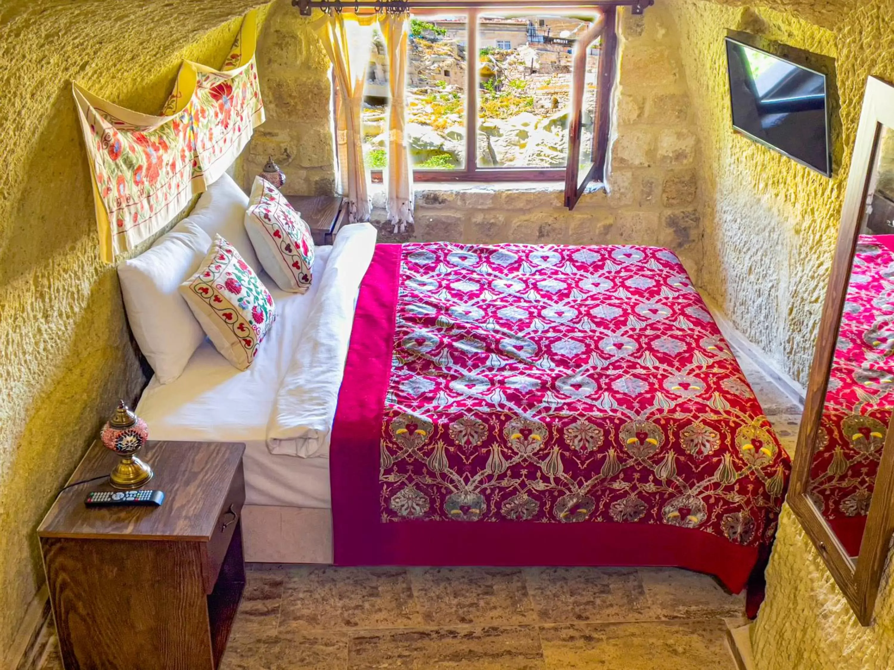Bed in Heritage Cave Suites