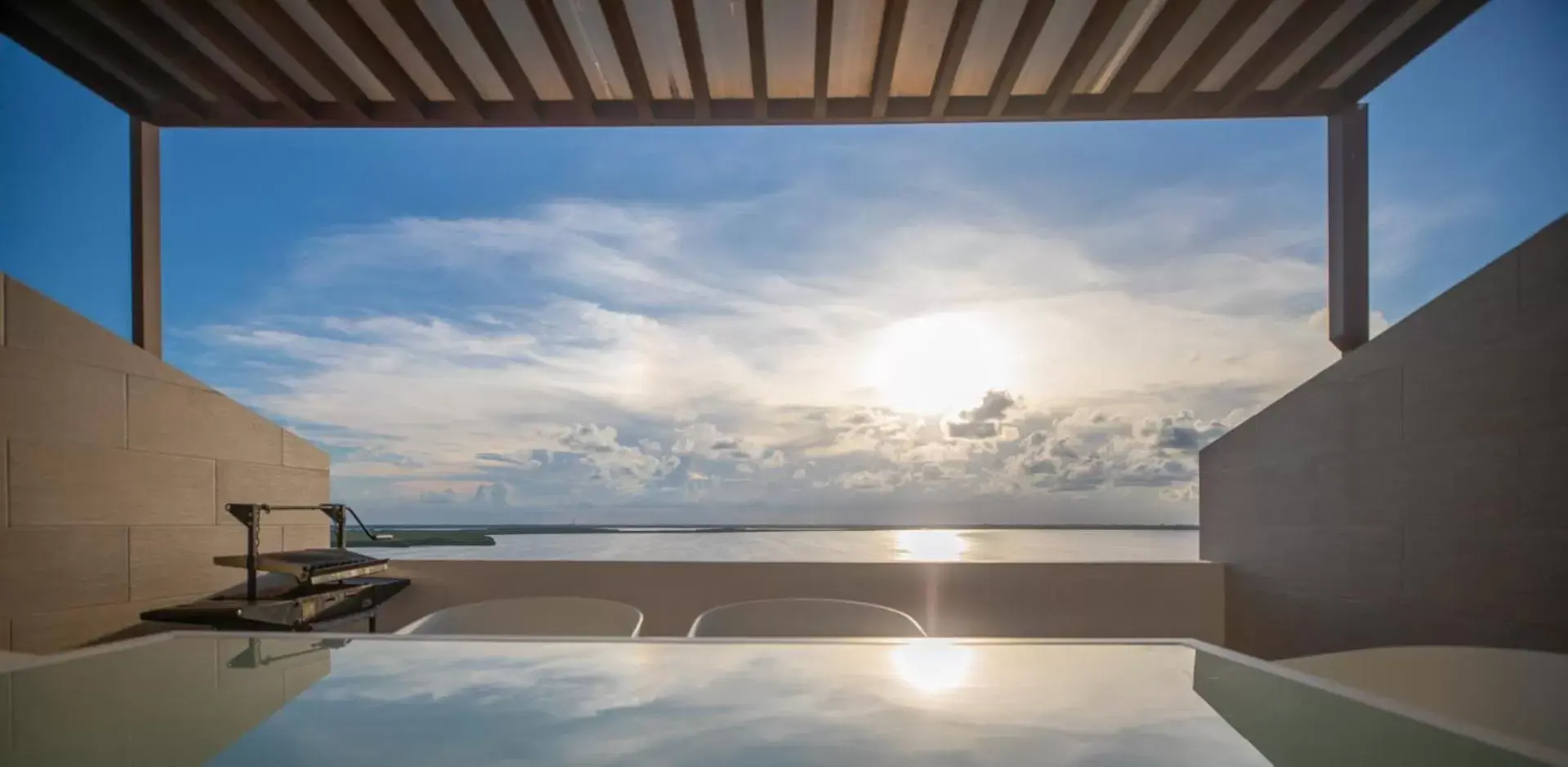 Balcony/Terrace, Swimming Pool in Beachfront Penthouses by LivIN Cancun