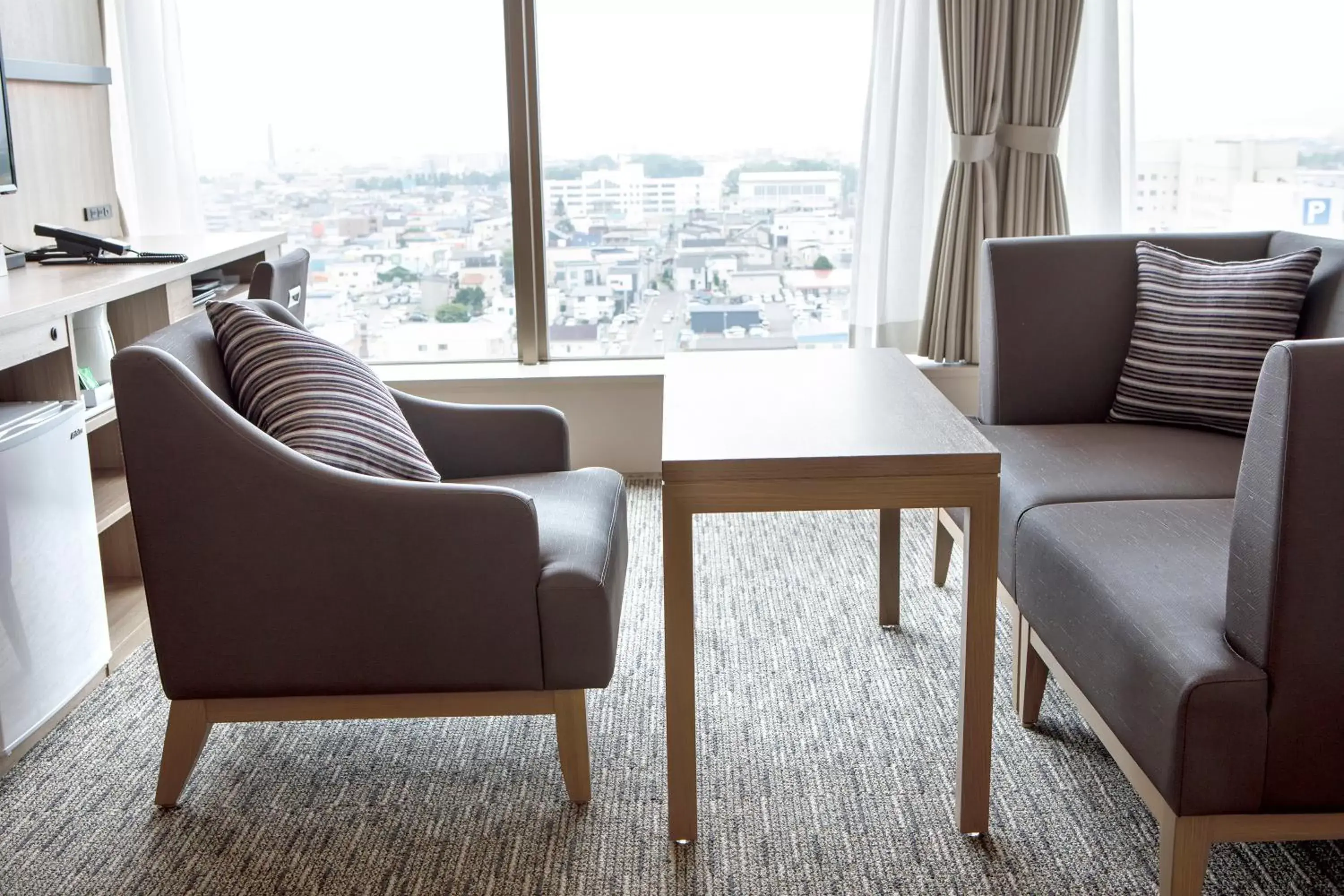 Photo of the whole room, Seating Area in HOTEL MYSTAYS Hakodate Goryokaku