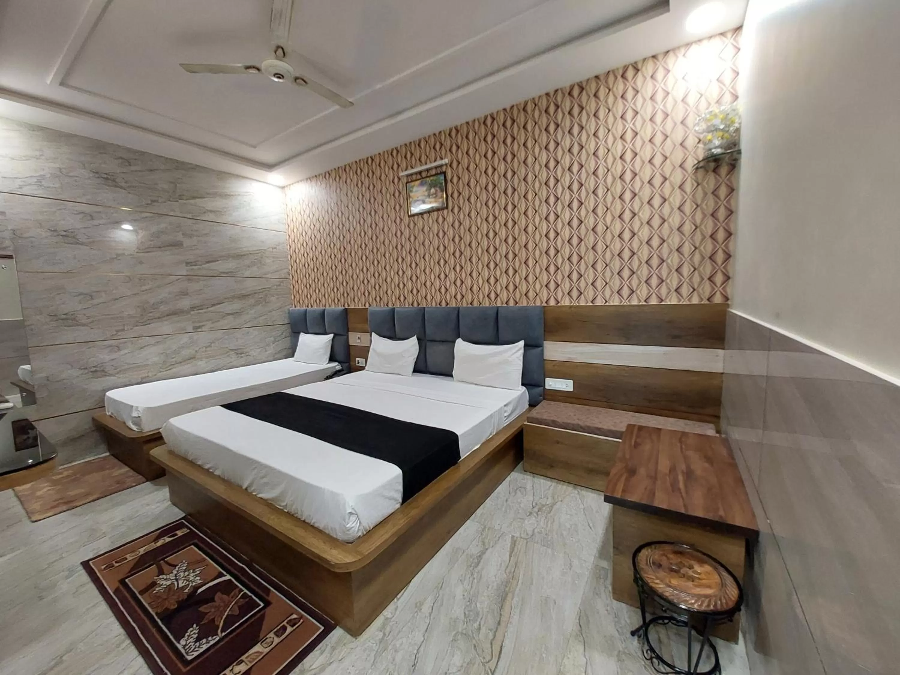 Bed in Taj Nice Point Manage by Taj Sunrise Group