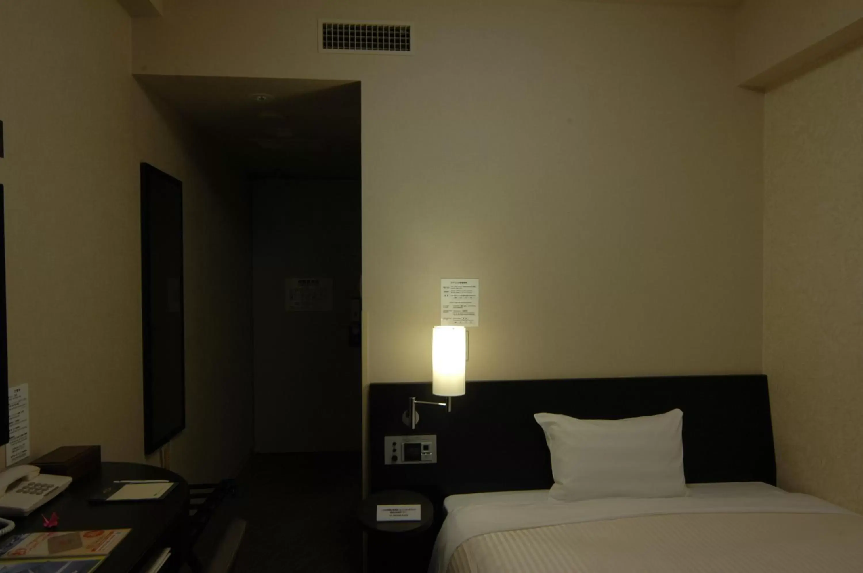 Bed in Hotel Route-Inn Kushiro Ekimae