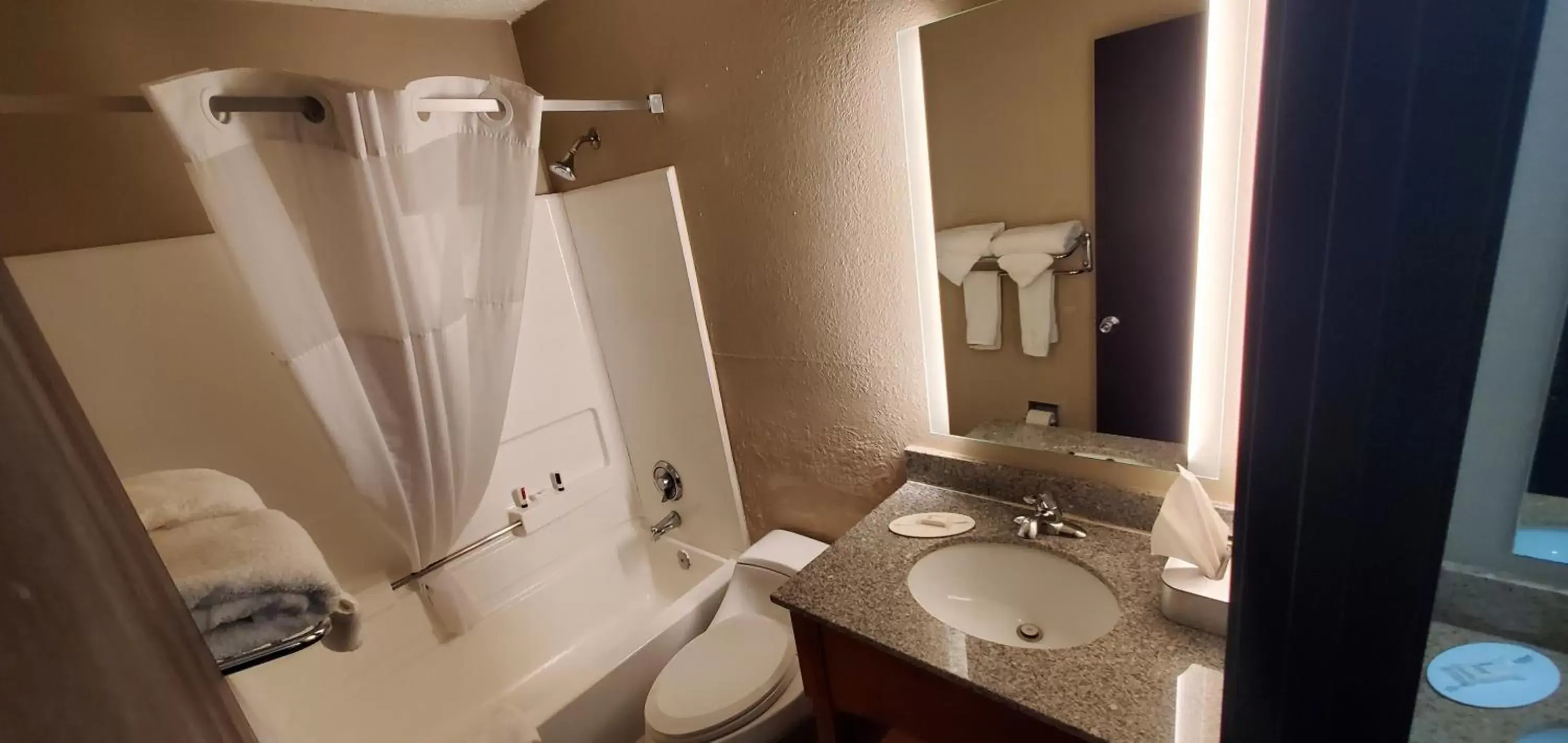 Bathroom in Super 8 by Wyndham Sterling Heights/Detroit Area