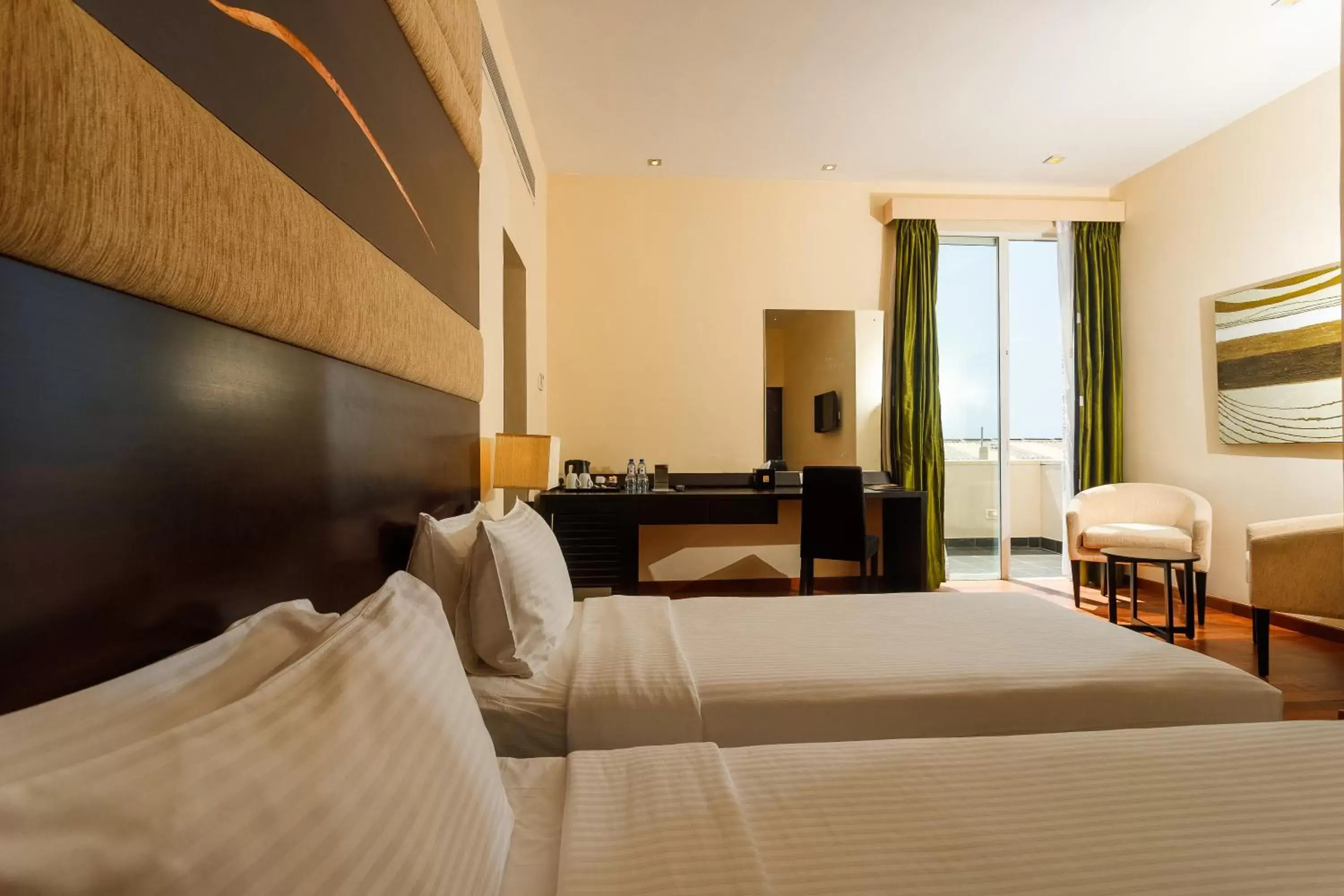 Bed in Renuka City Hotel