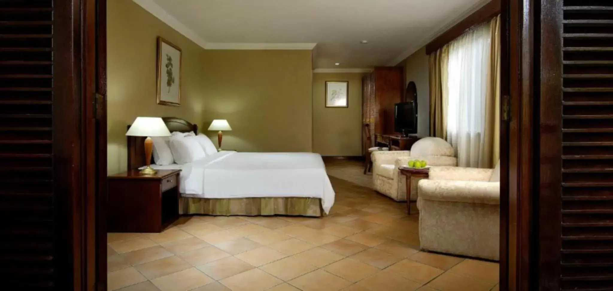 TV and multimedia, Bed in Berjaya Beau Vallon Bay Resort & Casino TV and multimedia, Bed in Berjaya Beau Vallon Bay Resort & Casino