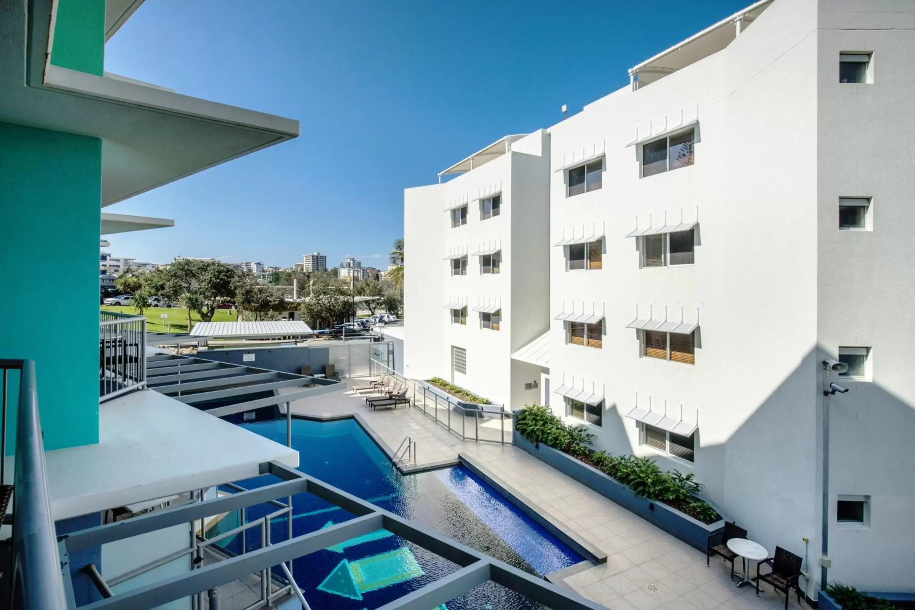 Balcony/Terrace, Pool View in Rolling Surf Resort