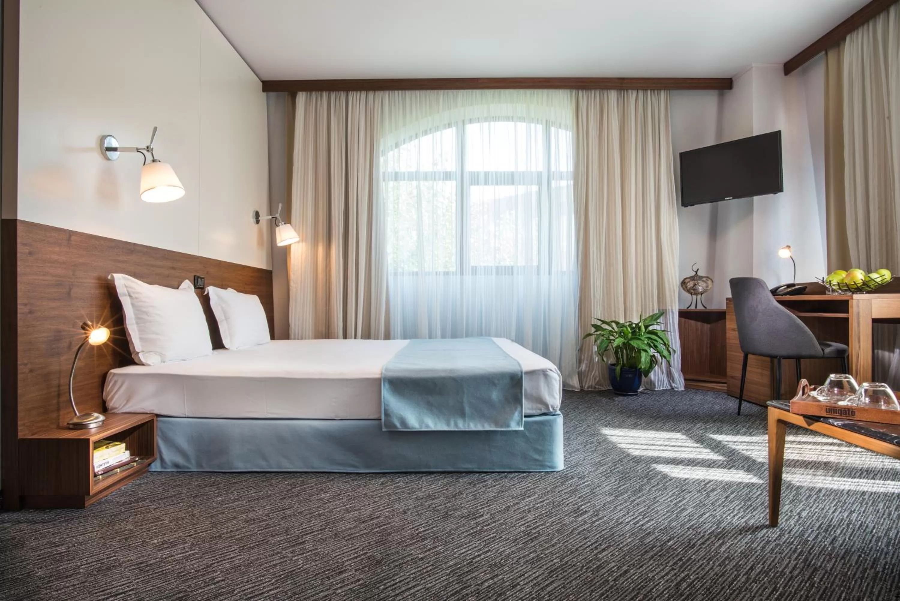 Photo of the whole room, Bed in Uniqato Hotel