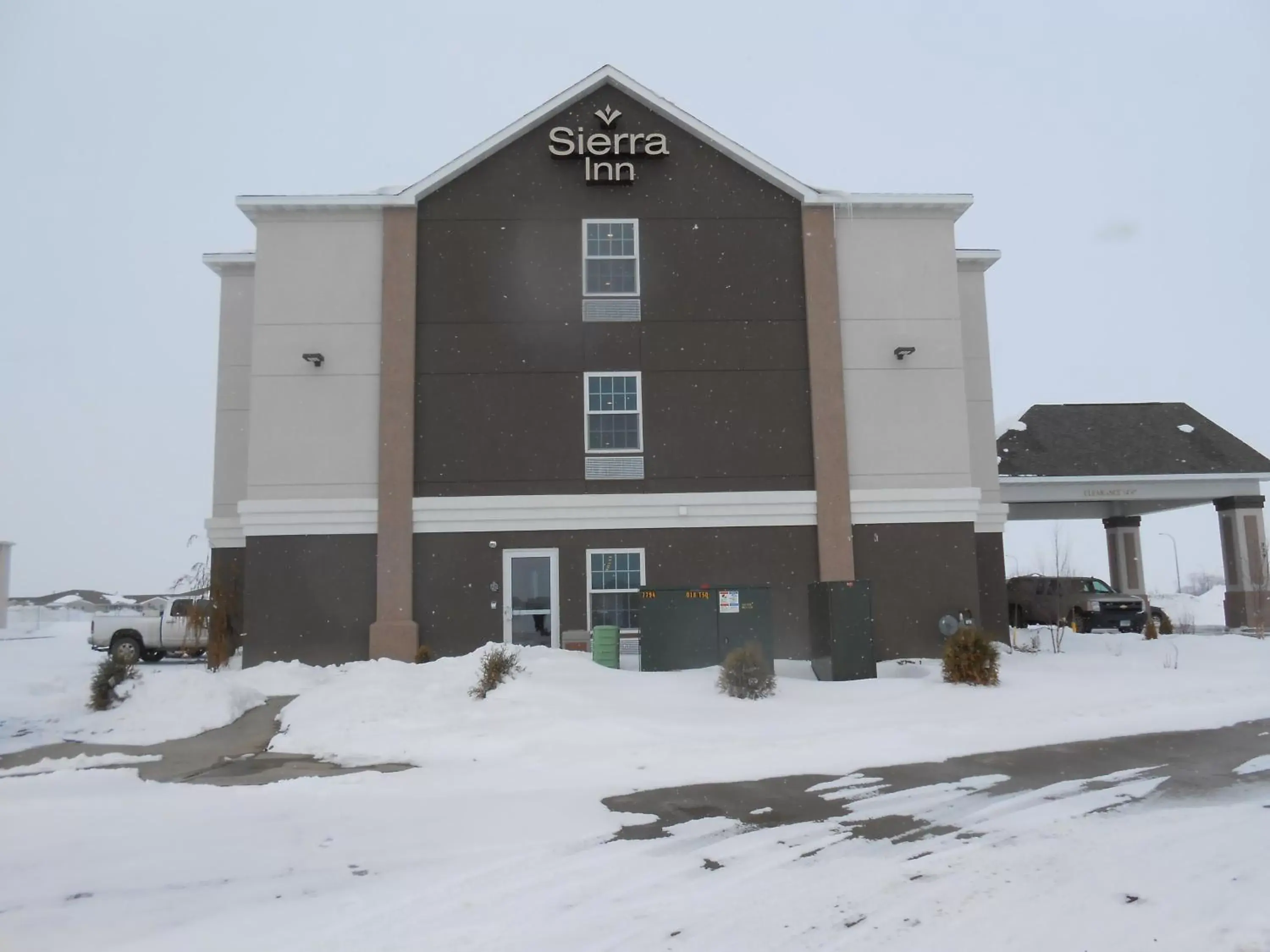 Property building, Winter in Sierra Inn Minot