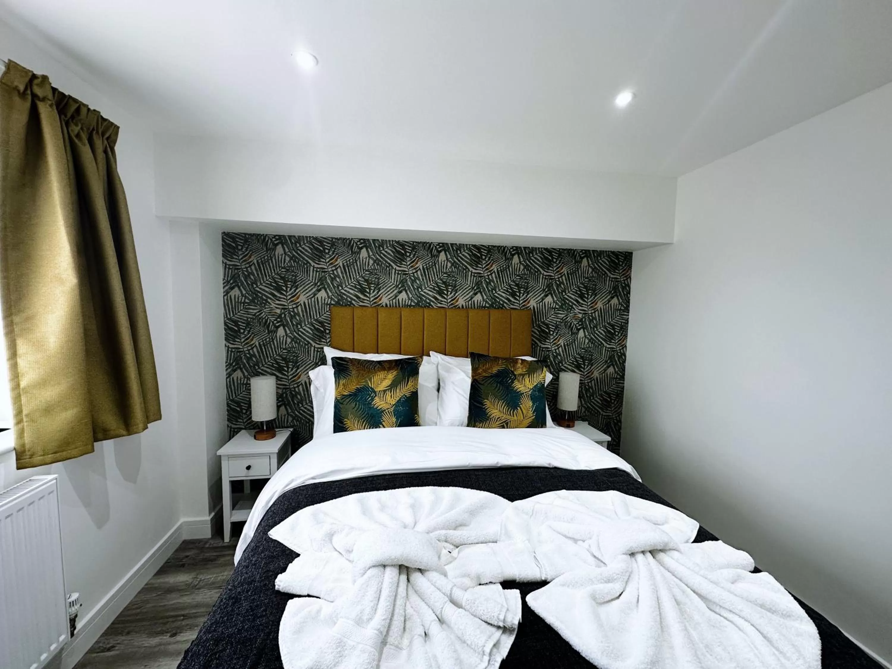 Bed in The Atlantis - Tower Apartments