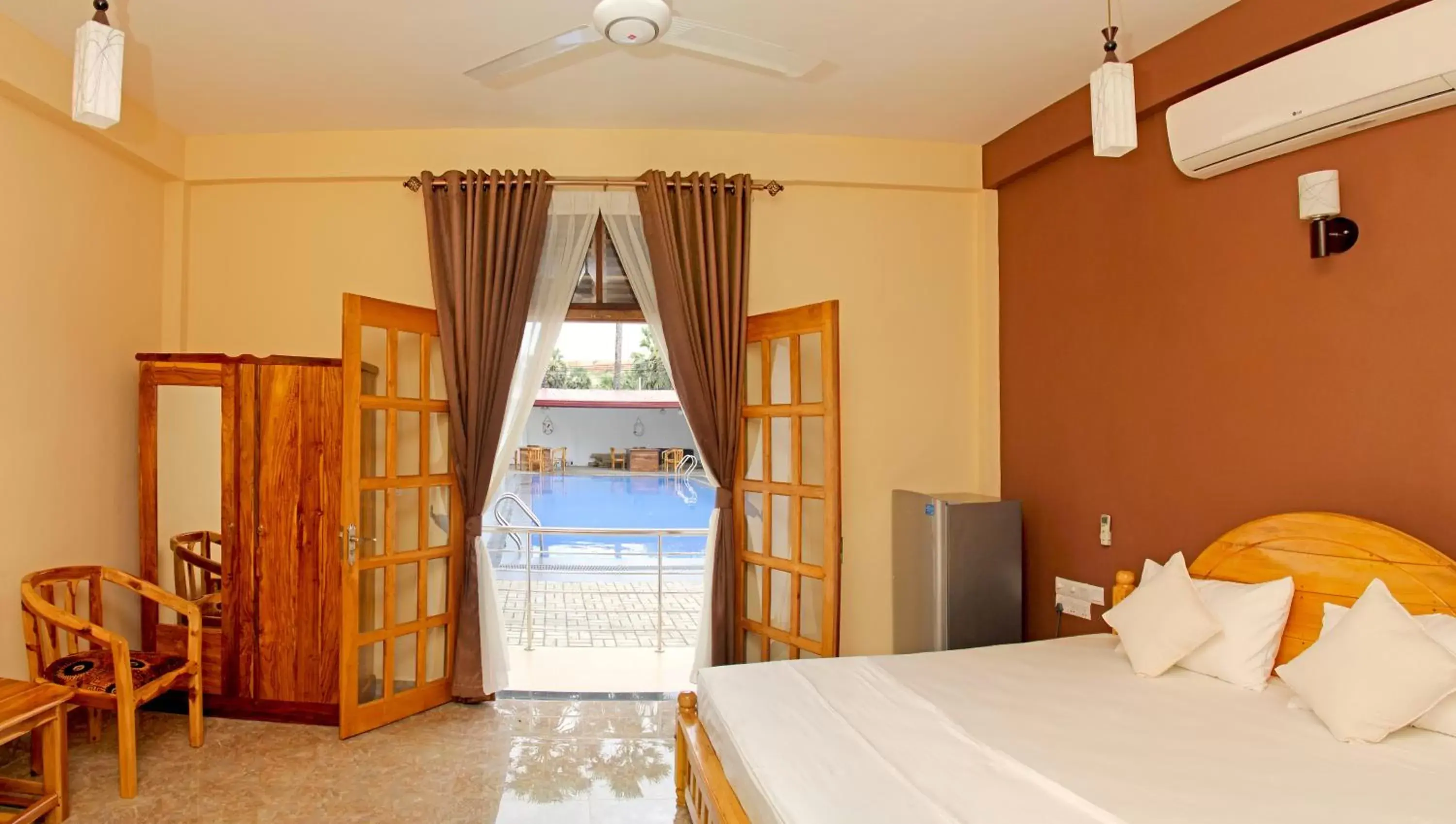 Deluxe Double Room with Pool View - Ground Floor in Bluewater Beach Resort Deluxe Double Room with Pool View - Ground Floor in Bluewater Beach Resort