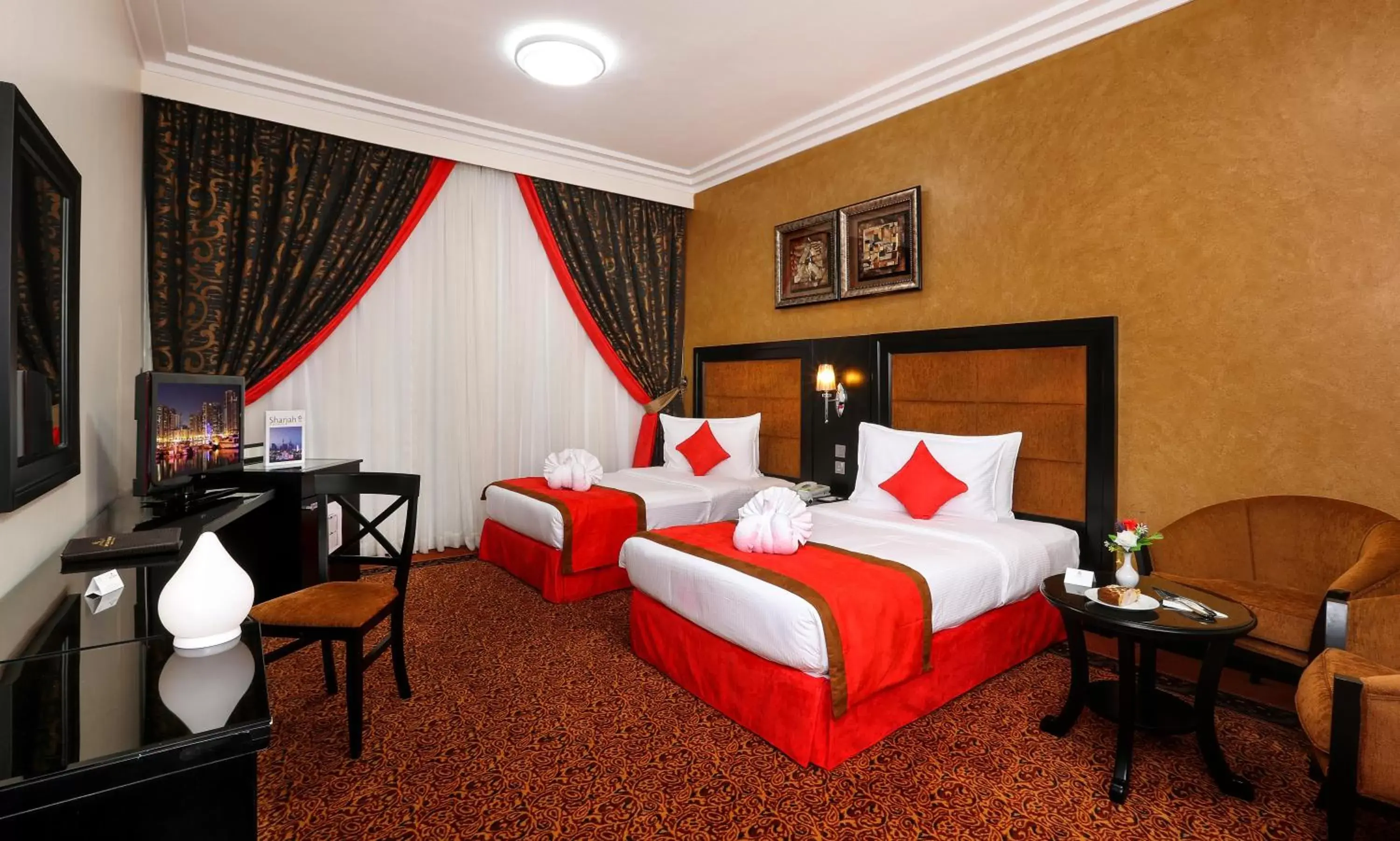 Bed in Royal Grand Suite Hotel
