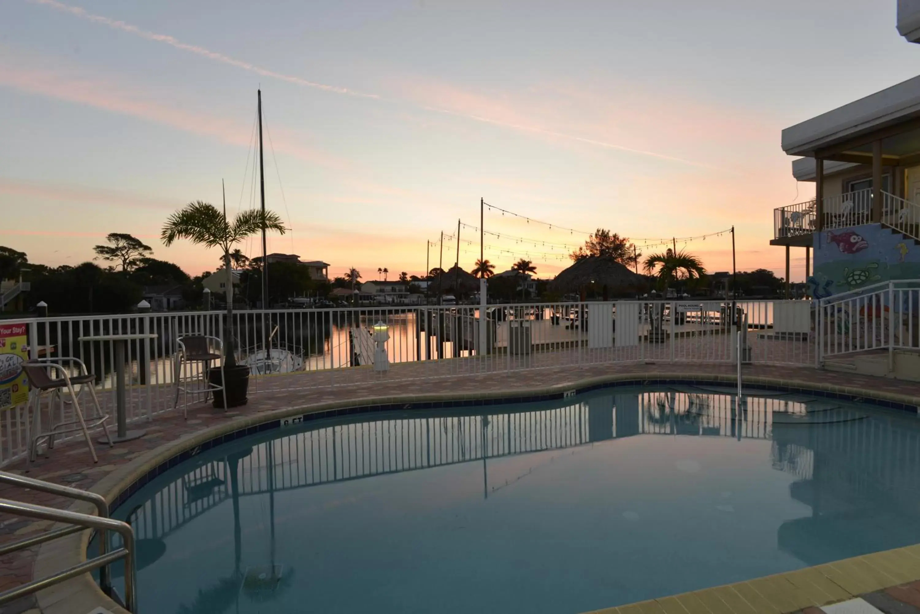 Patio, Swimming Pool in Bay Palms Waterfront Resort - Hotel and Marina