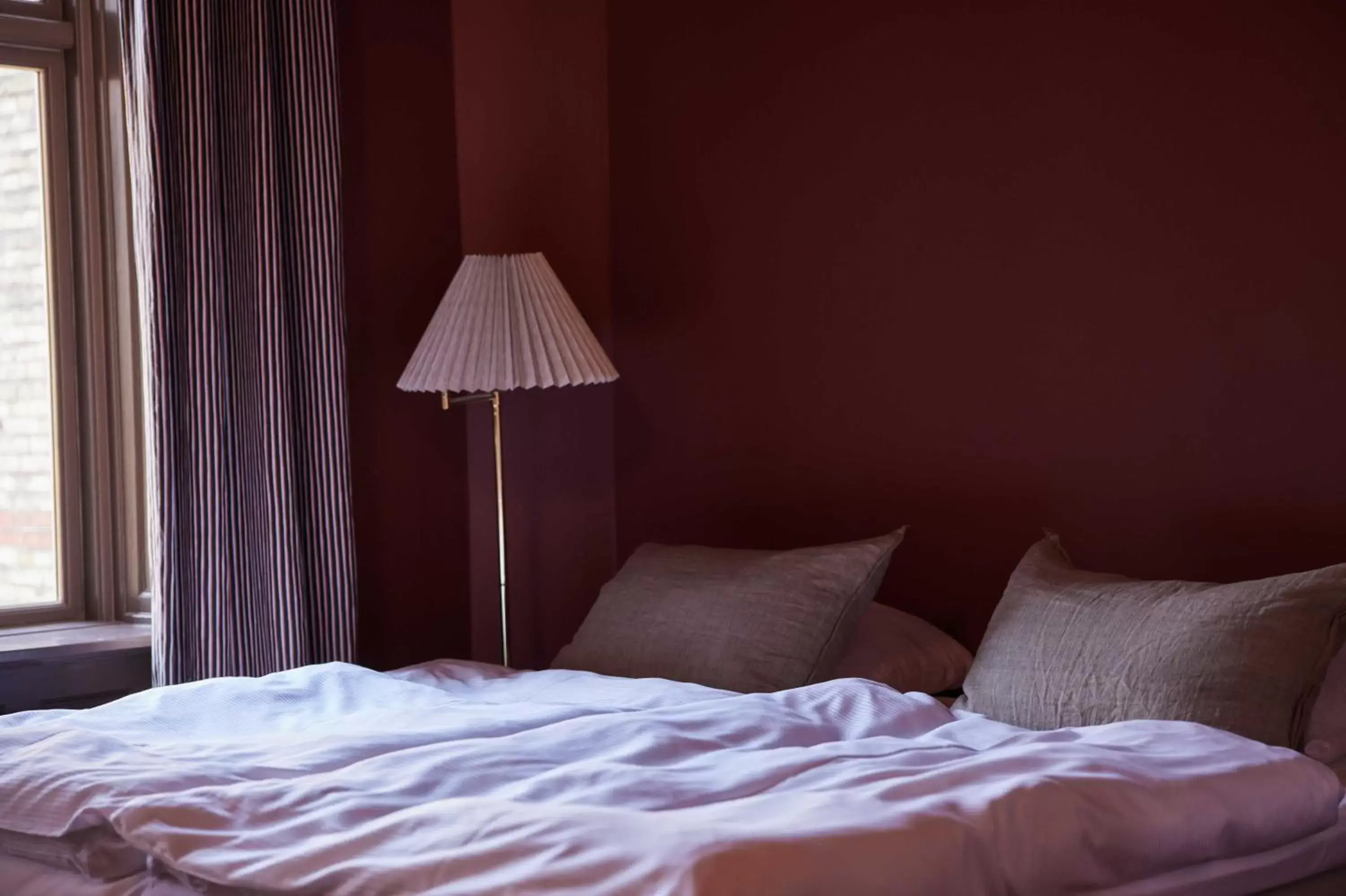 Bed in Rye115 Hotel