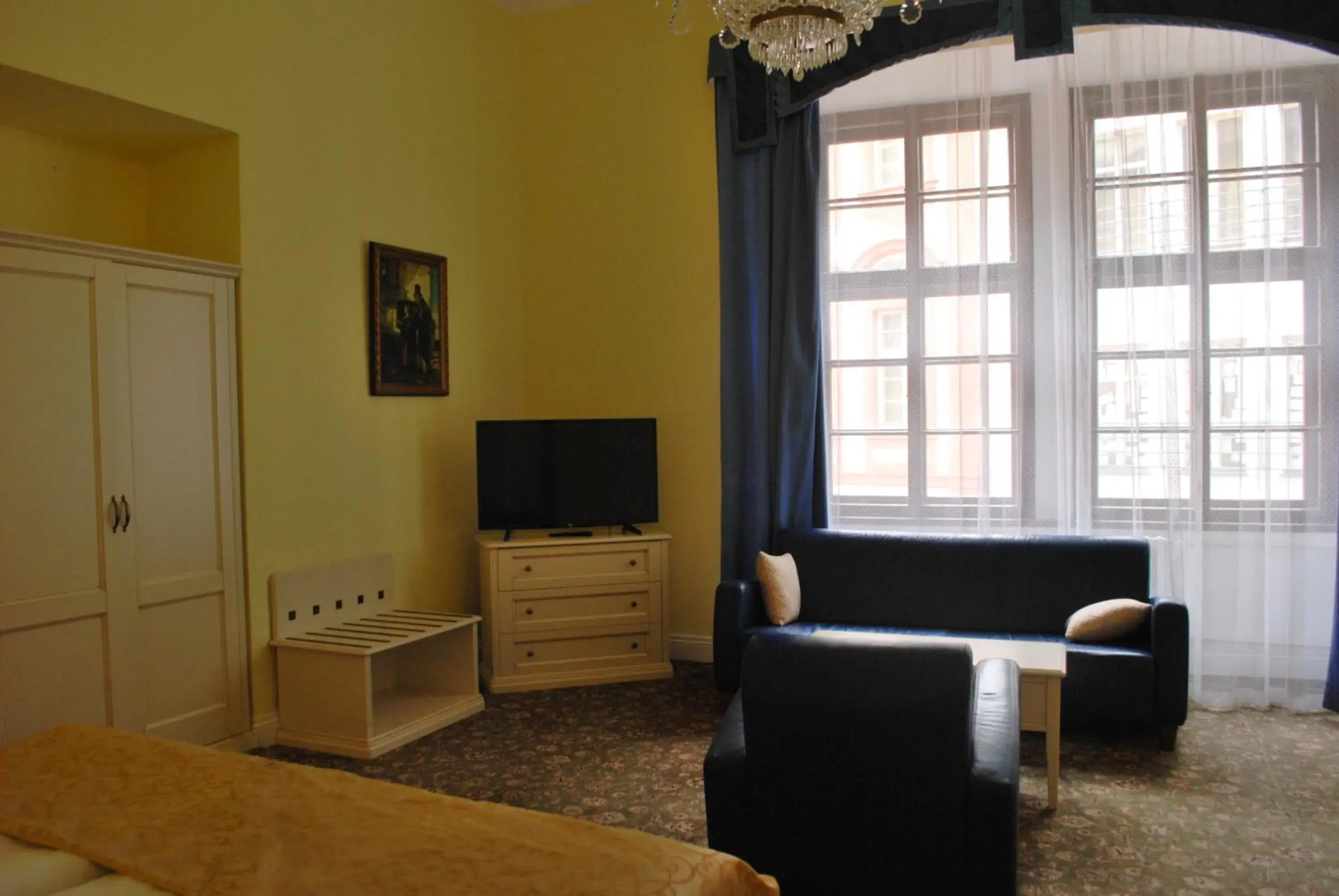 Communal lounge/ TV room, Seating Area in Hotel Metamorphis