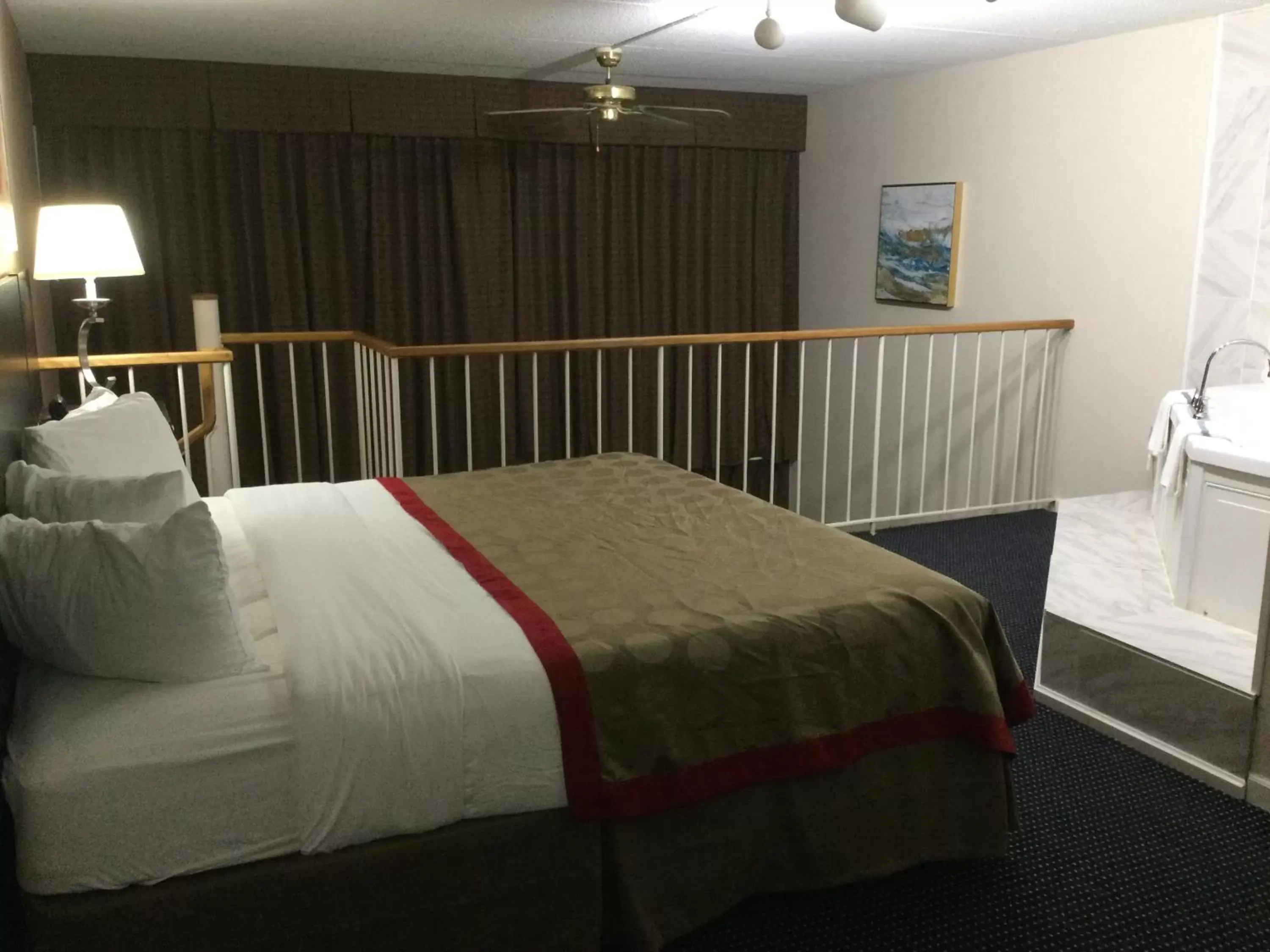 One Bedroom Suite with 1 King Bed, Courtyard/Poolside View Non-Smoking in Ramada by Wyndham Grayling Hotel & Conference Center One Bedroom Suite with 1 King Bed, Courtyard/Poolside View Non-Smoking in Ramada by Wyndham Grayling Hotel & Conference Center