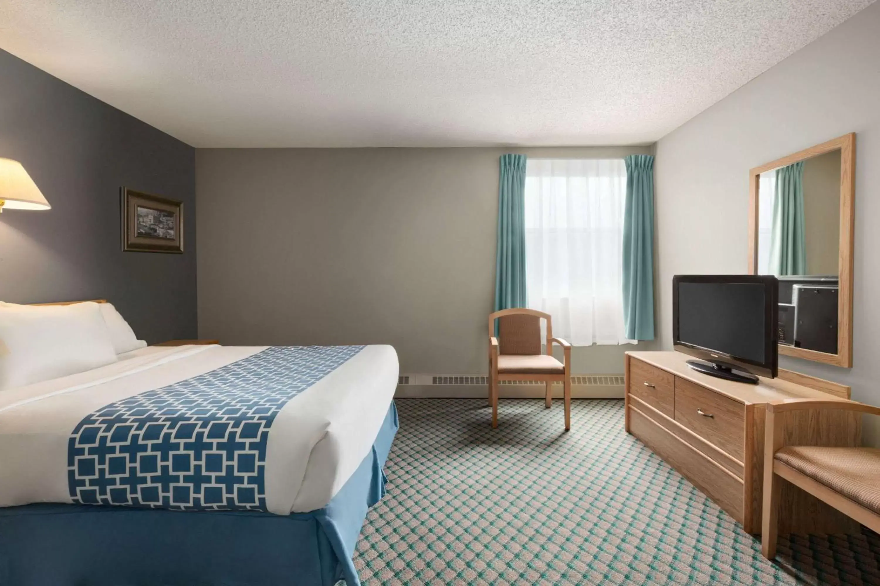 Photo of the whole room, Bed in Travelodge by Wyndham Edmonton Airport