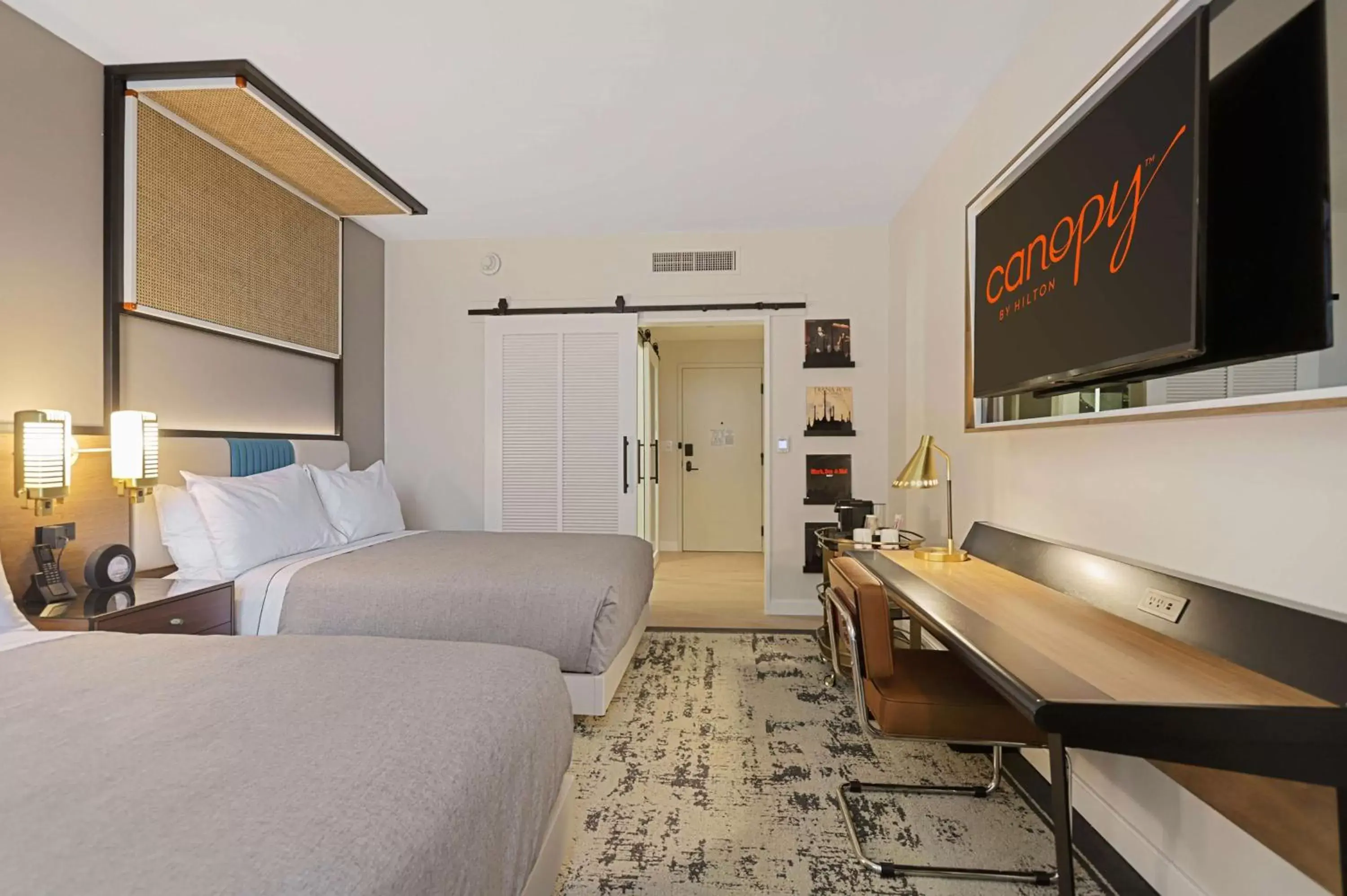 Bed, TV/Entertainment Center in Canopy by Hilton Memphis Downtown