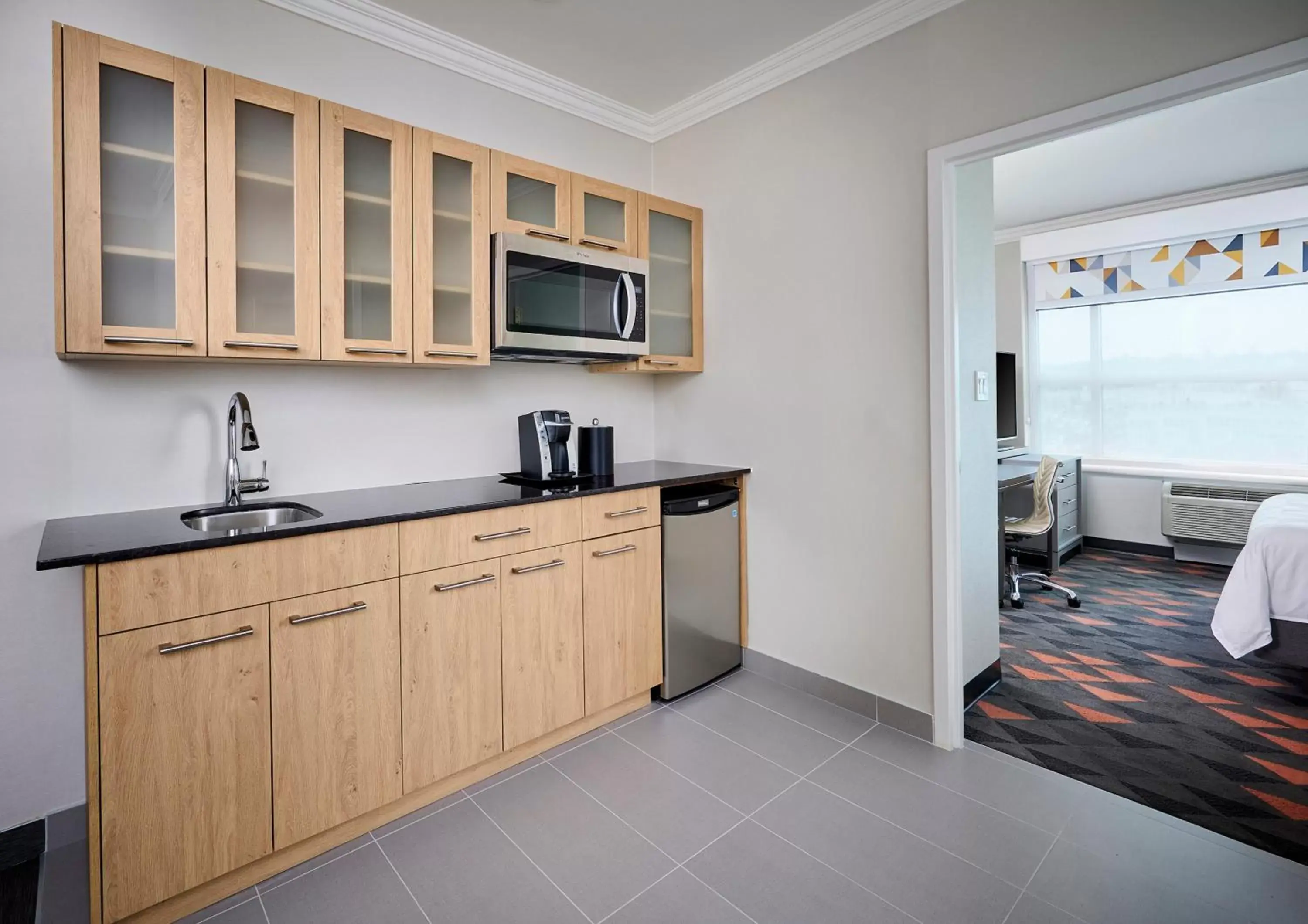 Photo of the whole room, Kitchen/Kitchenette in Holiday Inn & Suites Oakville at Bronte, an IHG Hotel