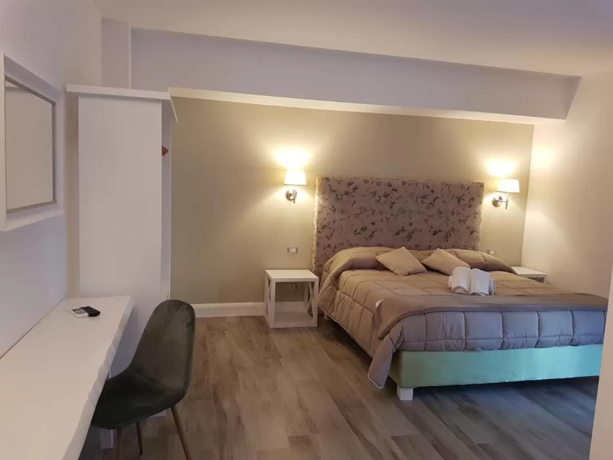 Bed in Hotel Pompei Be Green