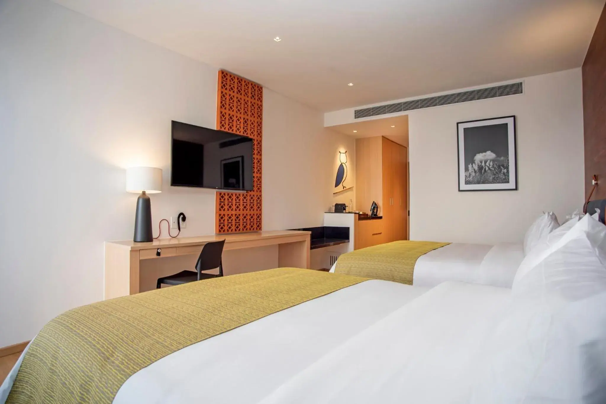Photo of the whole room, Bed in voco Guadalajara Neruda, an IHG Hotel