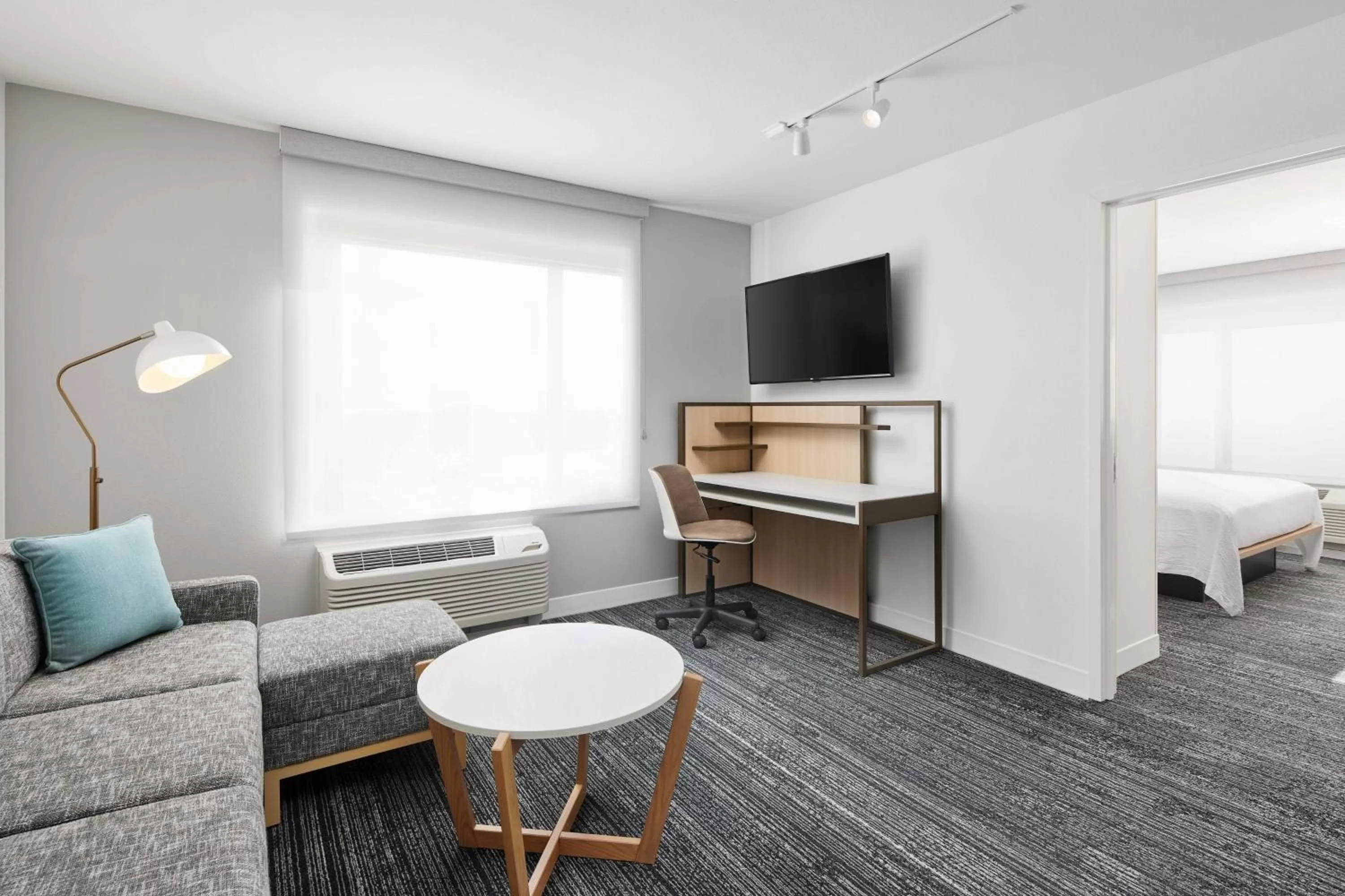 Living room, Bed in TownePlace Suites by Marriott Tampa Casino Area