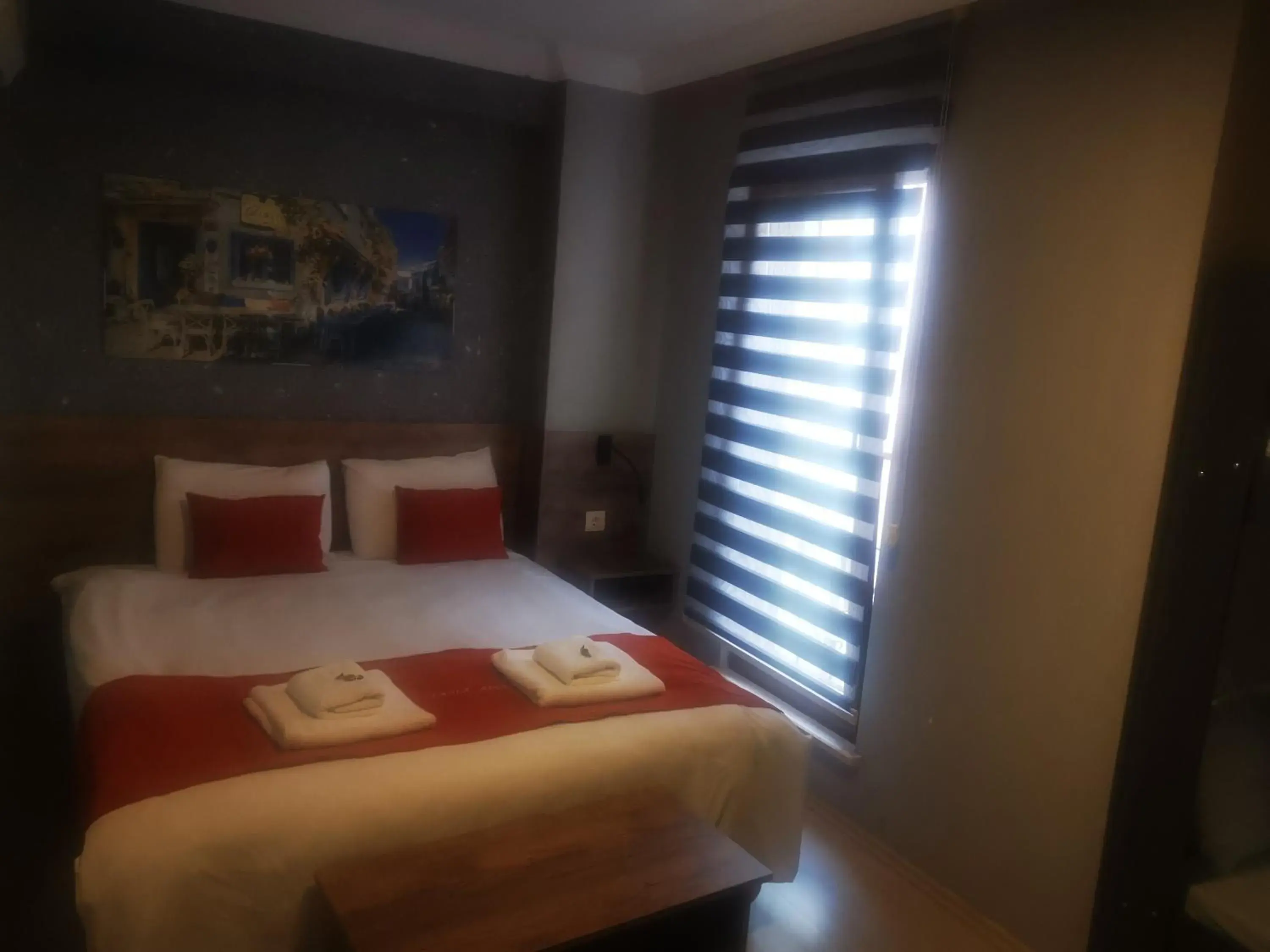 Bed in ADOR TROIA HOTEL