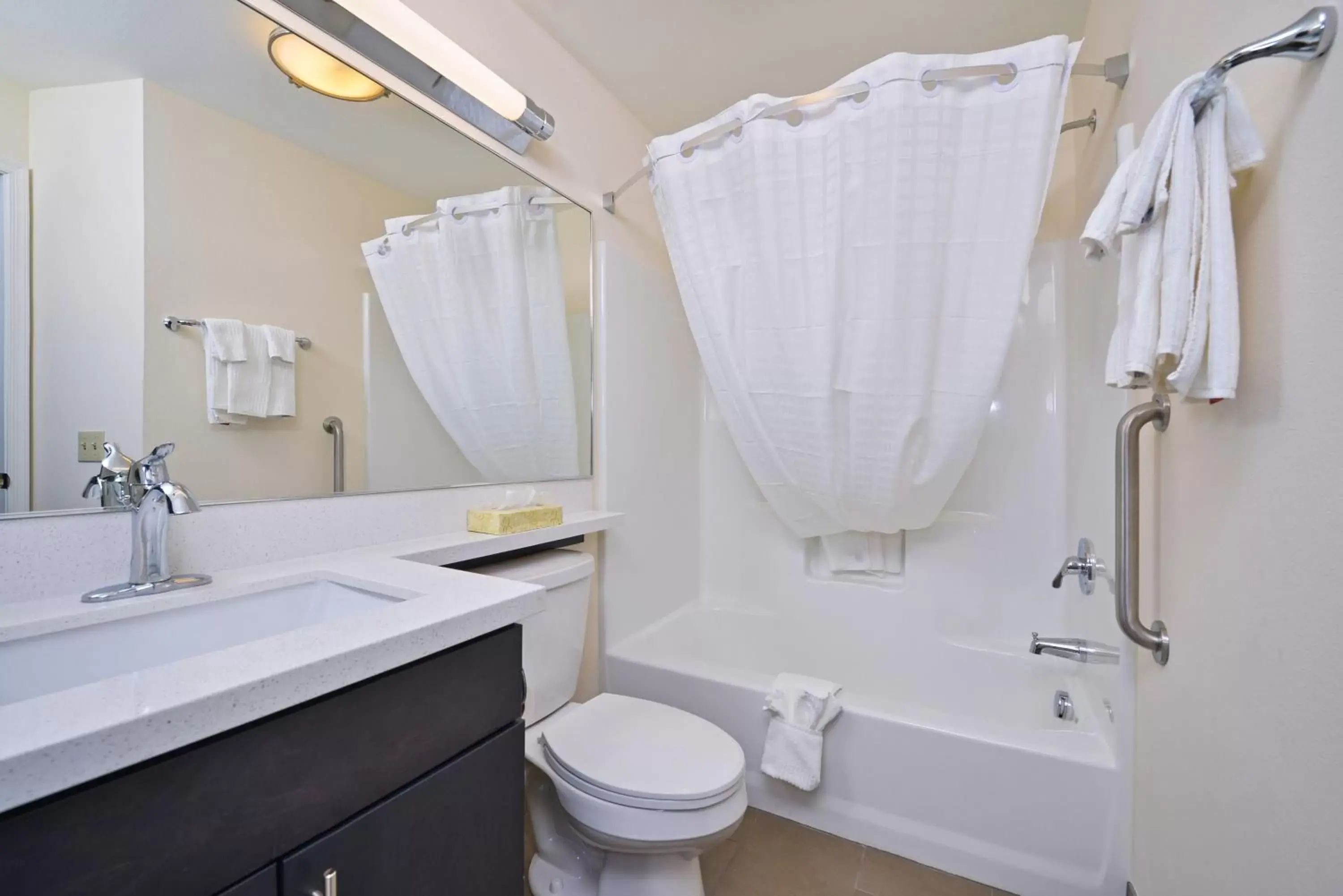 Bathroom in Candlewood Suites Harrisburg-Hershey, an IHG Hotel