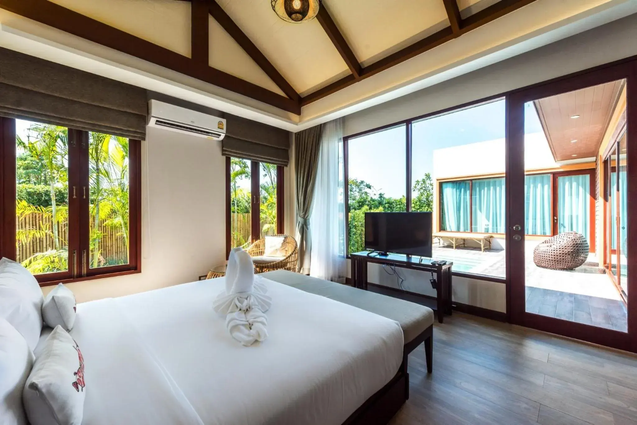 Bed in Triple Tree Beach Resort