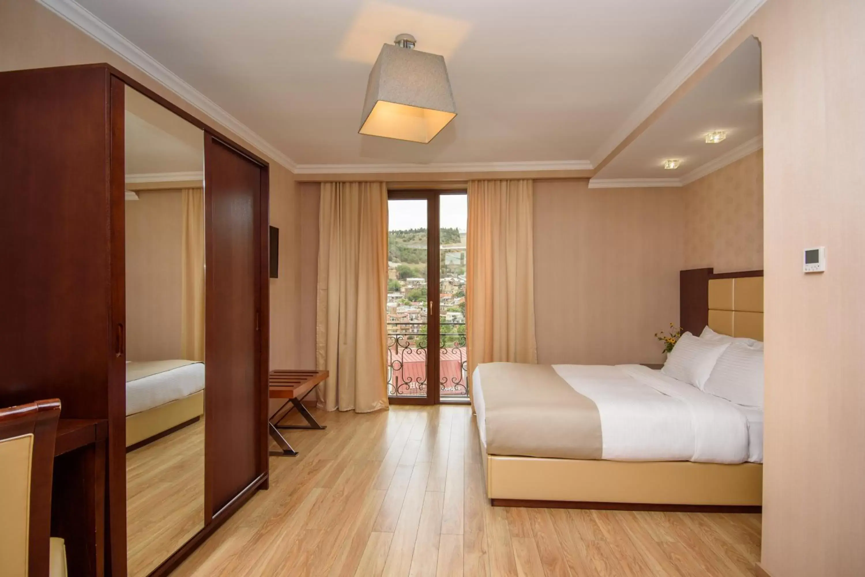 Bedroom in KMM Hotel