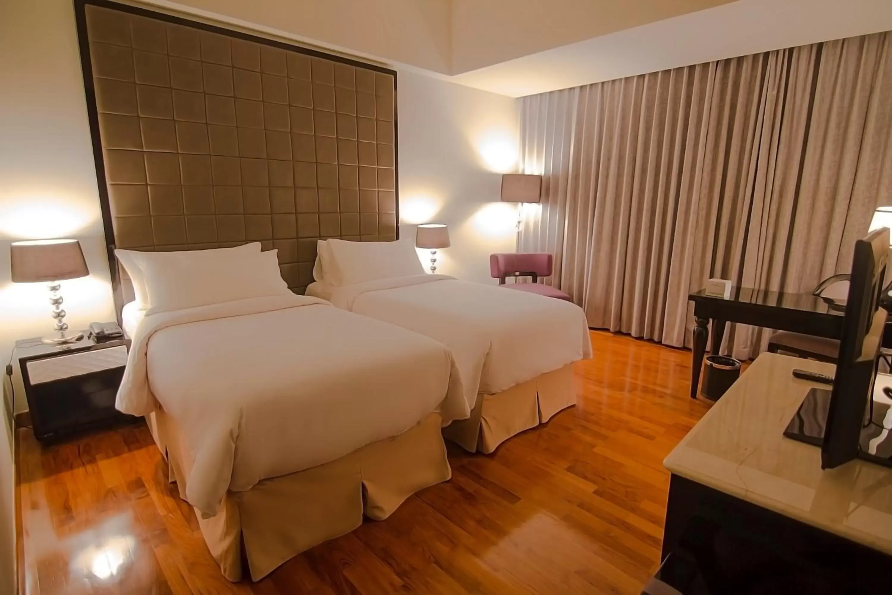 Photo of the whole room, Bed in Diradja Hotel Indonesia