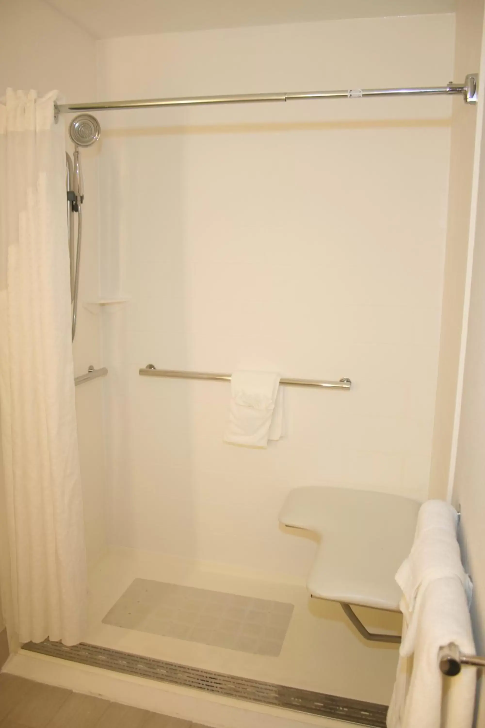 Shower, Bathroom in Holiday Inn Express, an IHG Hotel