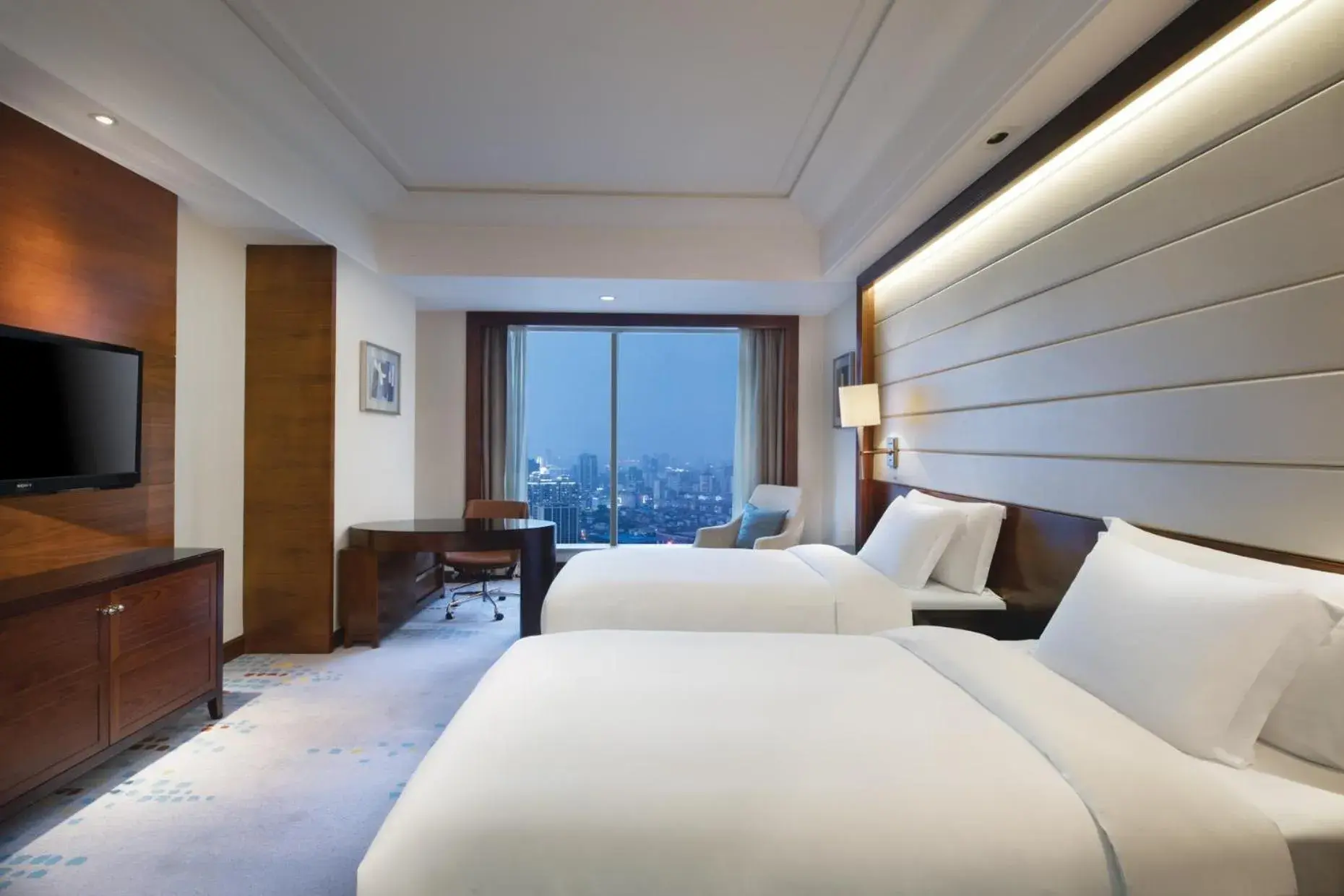 Bedroom in Crowne Plaza Nanchang Riverside, an IHG Hotel