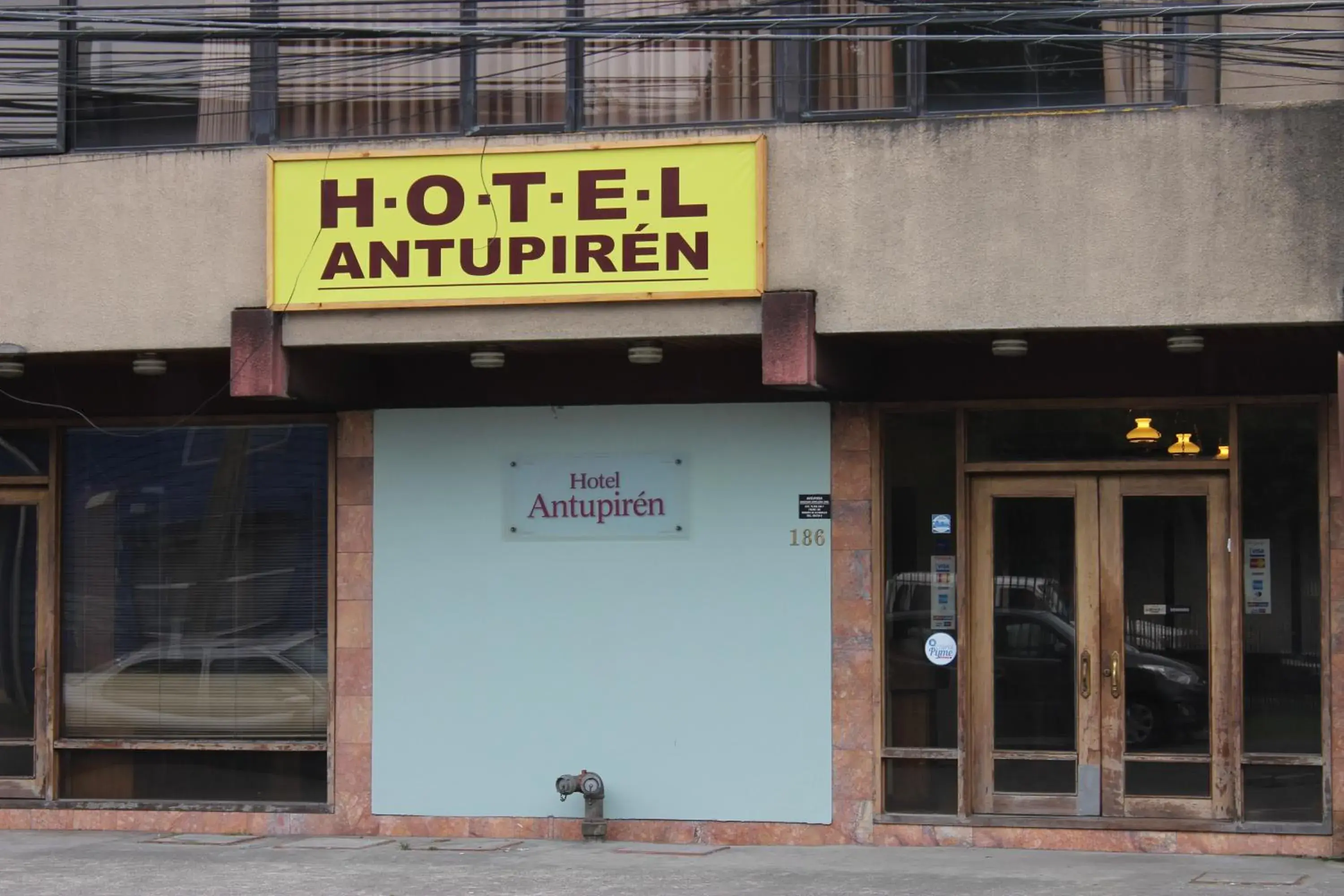 Property logo or sign in Hotel Antupiren