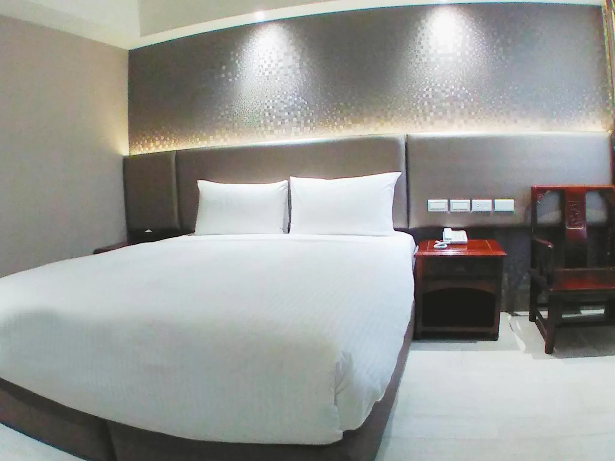 Bed in KDM Hotel