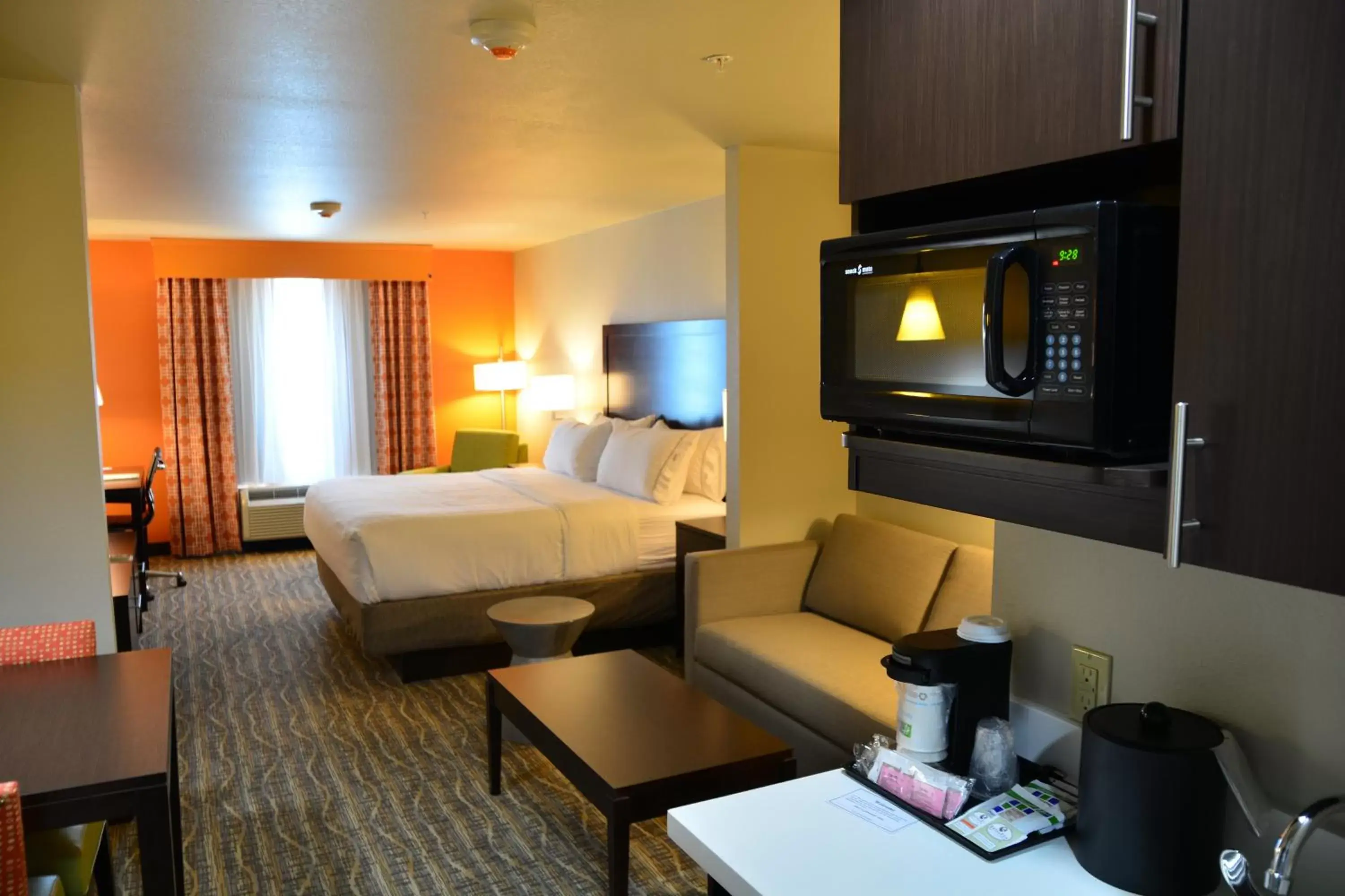 Photo of the whole room, TV/Entertainment Center in Holiday Inn Express Tomball, an IHG Hotel