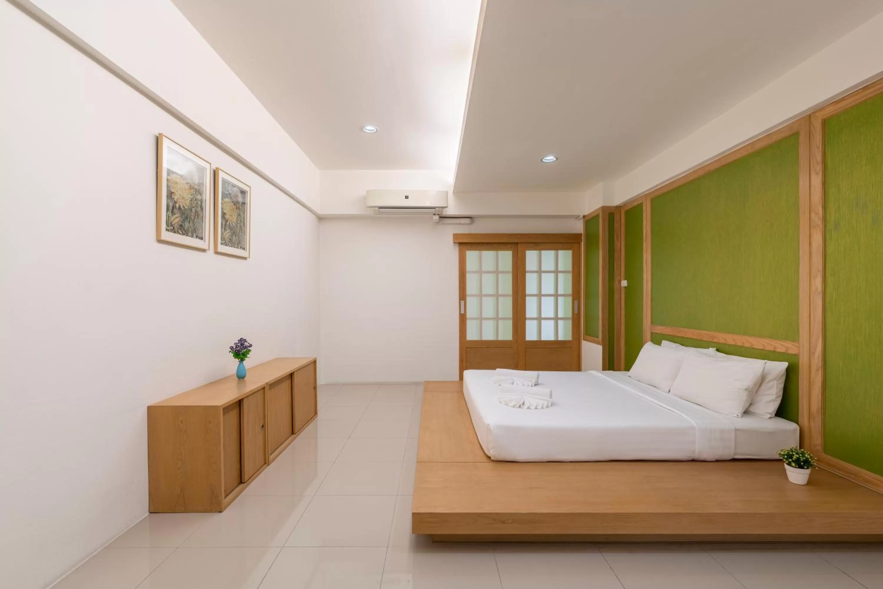 Bed in At 115 Hotel By Rompo