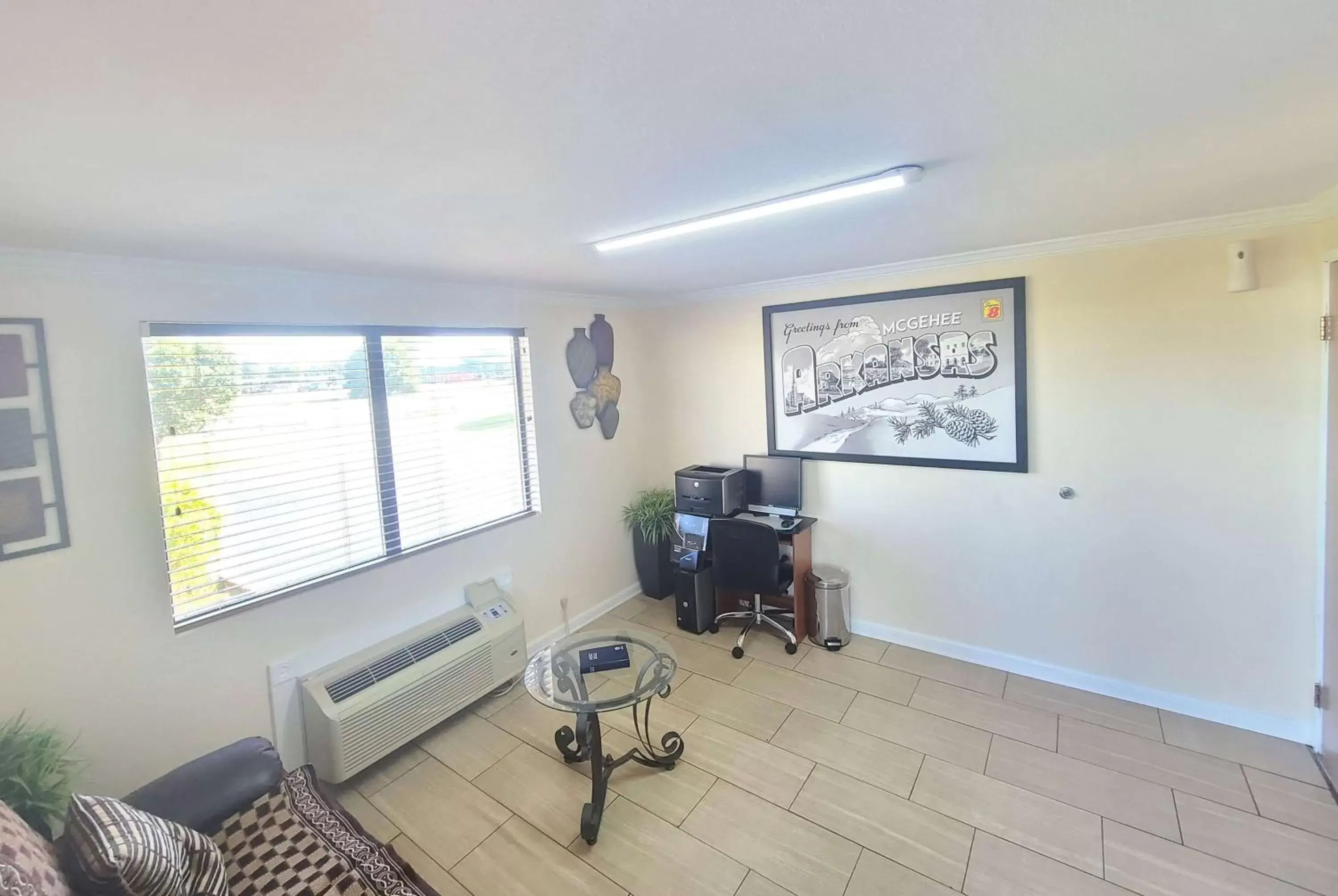 Lobby or reception in Super 8 by Wyndham McGehee Lobby or reception in Super 8 by Wyndham McGehee