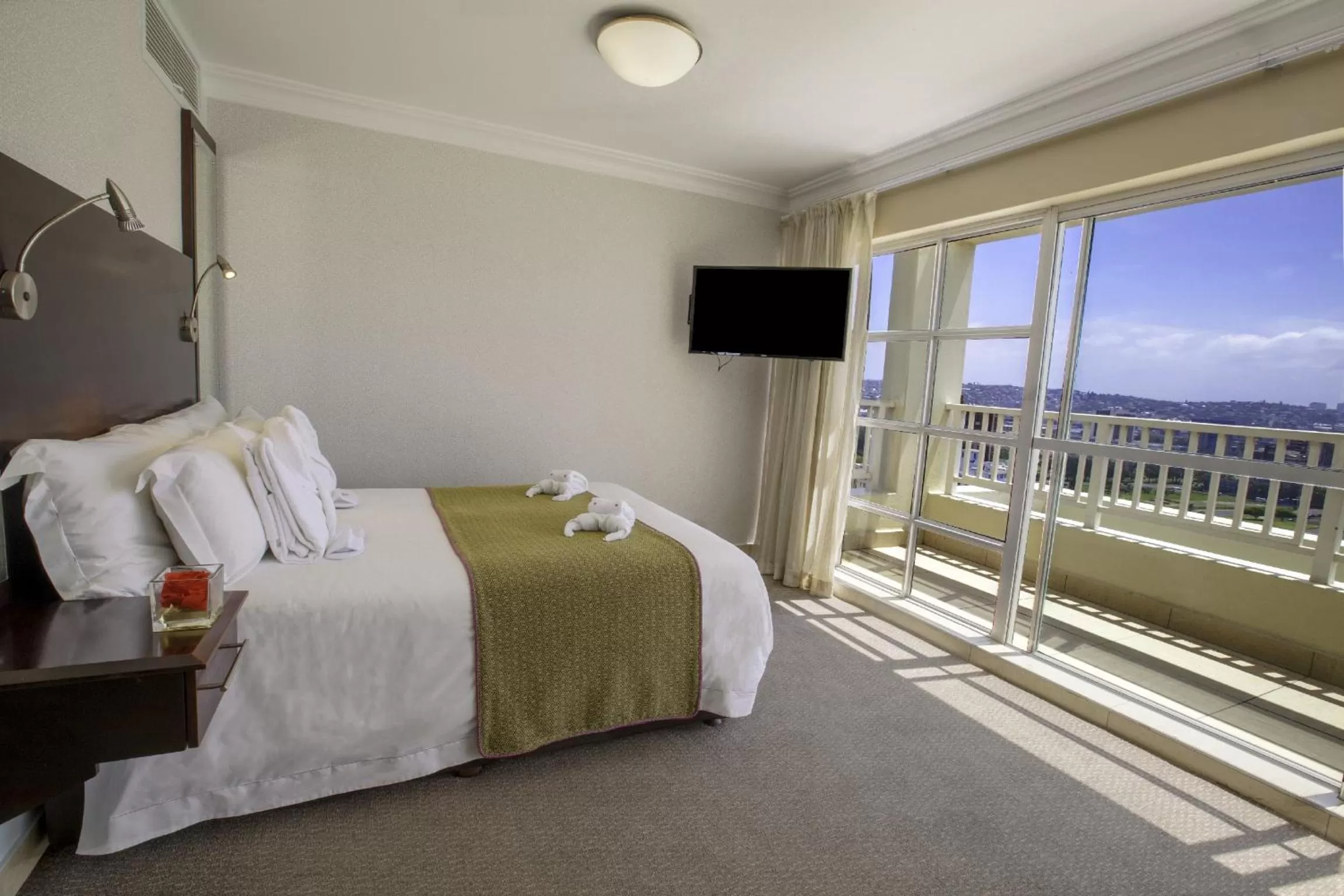 Bed in First Group The Palace All-Suite