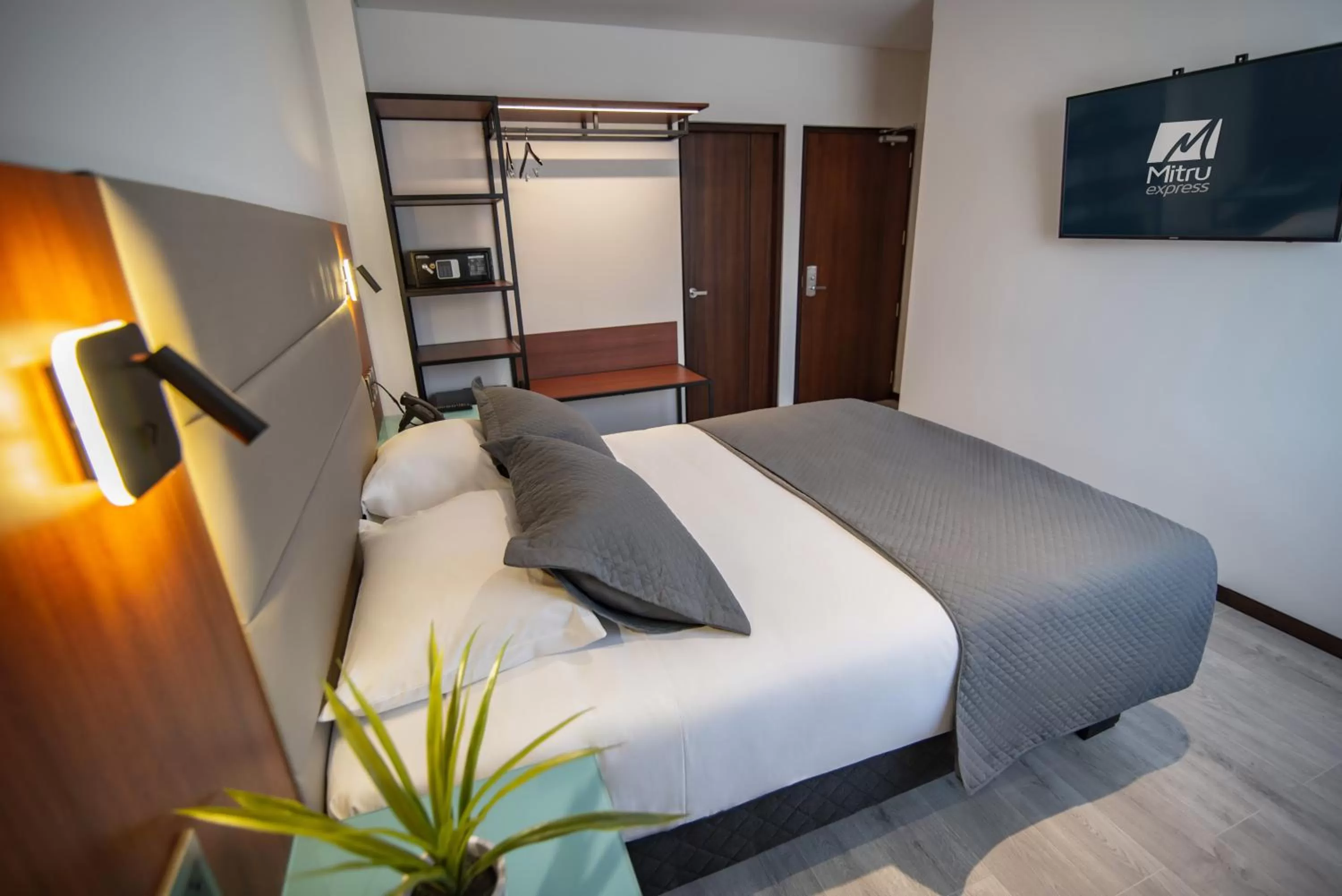 Bed in Mitru Express Hotel